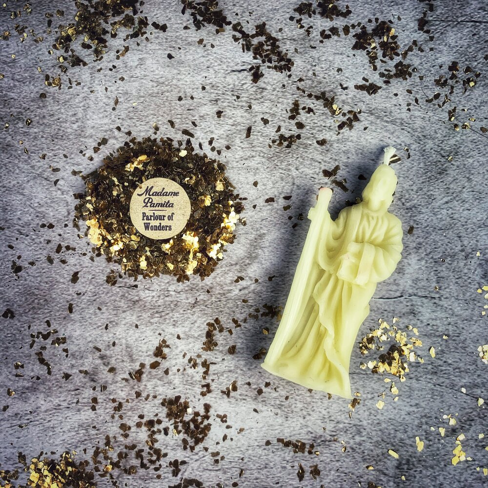 Red beeswax St. Joseph spell candle by Parlour of Wonders, used for home sale and career success magic.