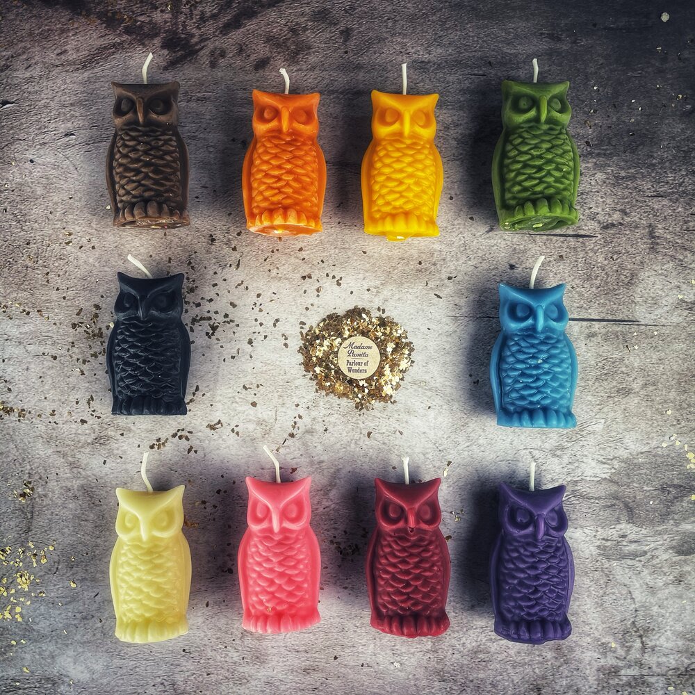 Red beeswax Wise Owl Spell Candle by Parlour of Wonders, featuring an owl design for wisdom and psychic awareness magic.