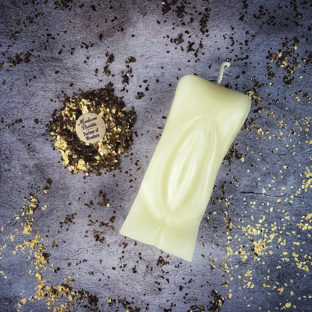 Red beeswax Yoni vulva spell candle by Parlour of Wonders, designed for passionate love and sex magic rituals.