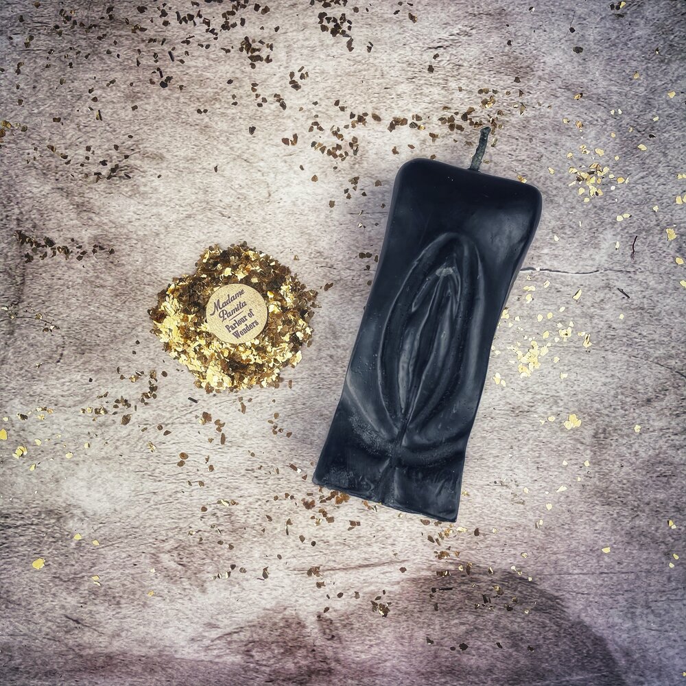 Red beeswax Yoni vulva spell candle by Parlour of Wonders, designed for passionate love and sex magic rituals.
