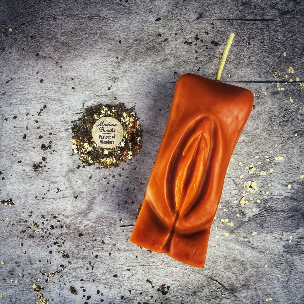 Red beeswax Yoni vulva spell candle from Parlour of Wonders, designed for passionate love and sex magic rituals.