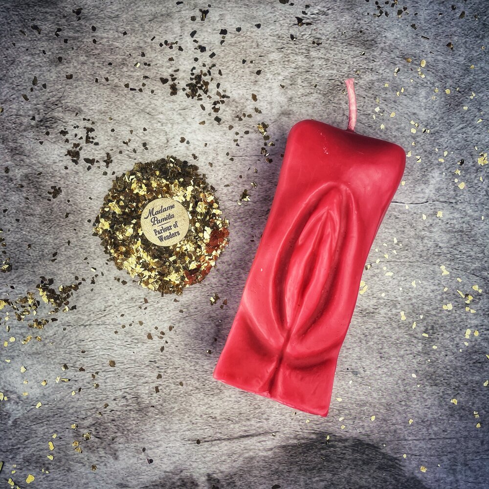 Red beeswax yoni vulva spell candle by Parlour of Wonders, designed for passionate love and sex magic rituals.