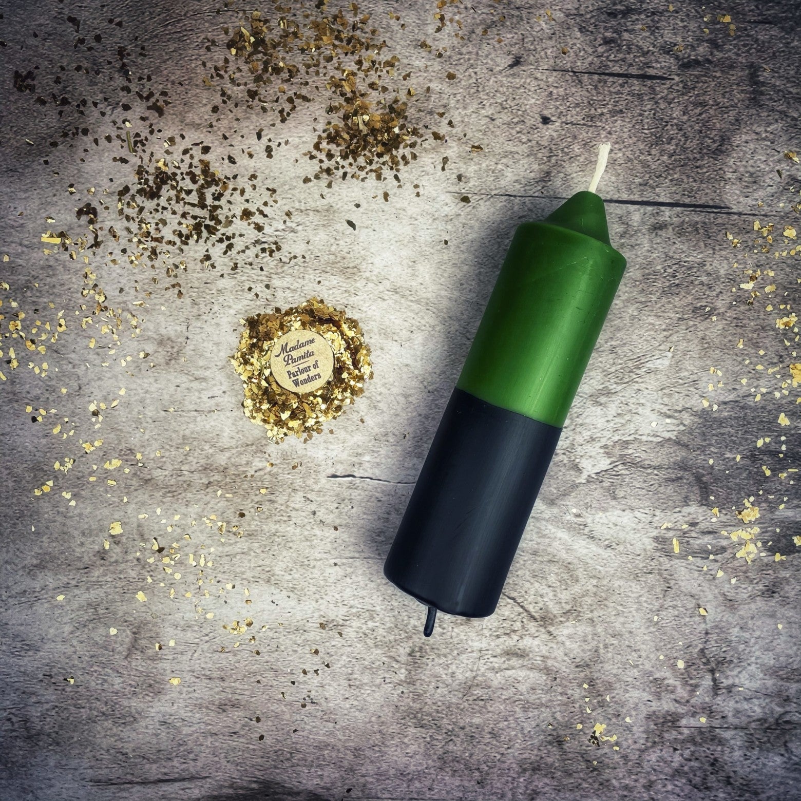 Yellow and black beeswax double action reversing spell candle by Parlour of Wonders for protection and curse reversal magic.