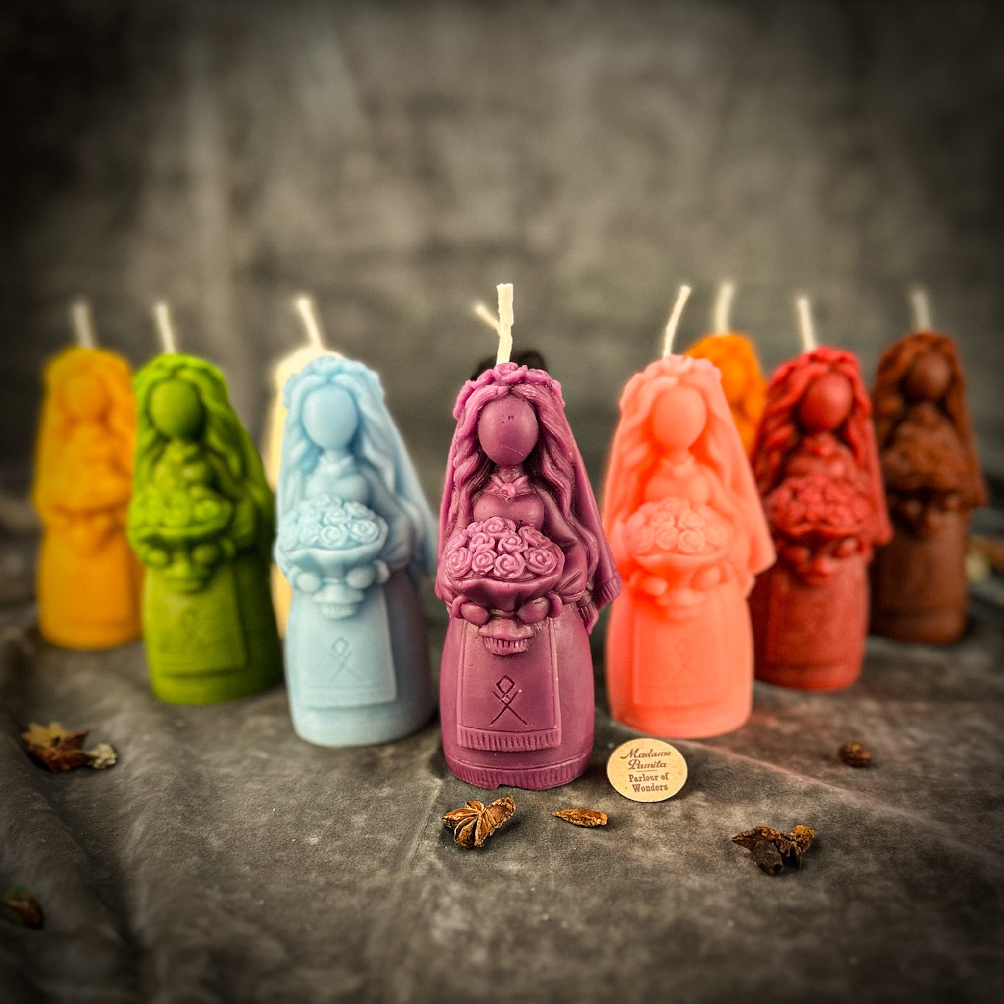 Yellow beeswax Lada Motanka spell candle by Parlour of Wonders with traditional design for blessings, love, and protection.