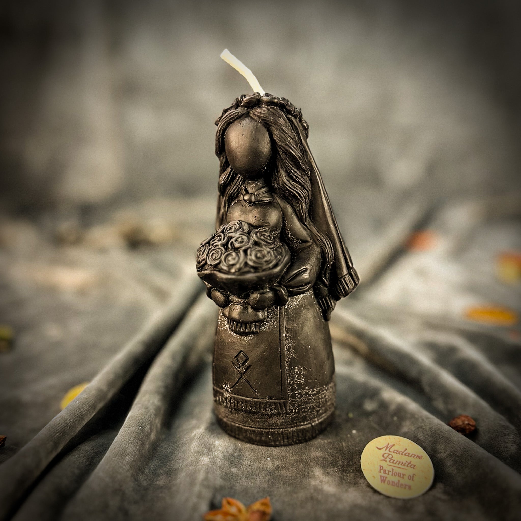 Yellow beeswax Lada Motanka spell candle by Parlour of Wonders with traditional design for love, protection, and ancestral blessings.
