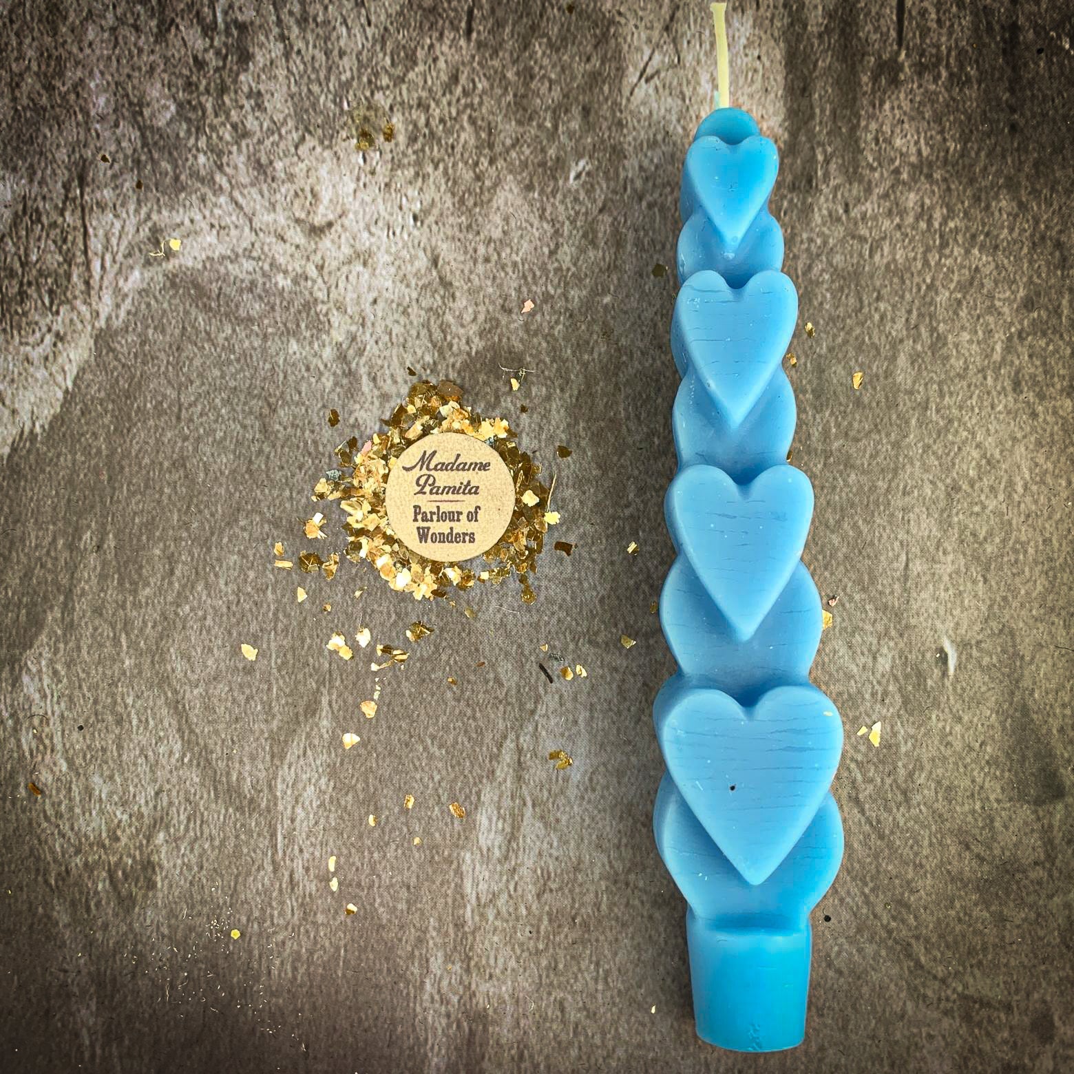 Yellow beeswax Love Spell Heart Taper Candle by Parlour of Wonders for romance and attraction magic.