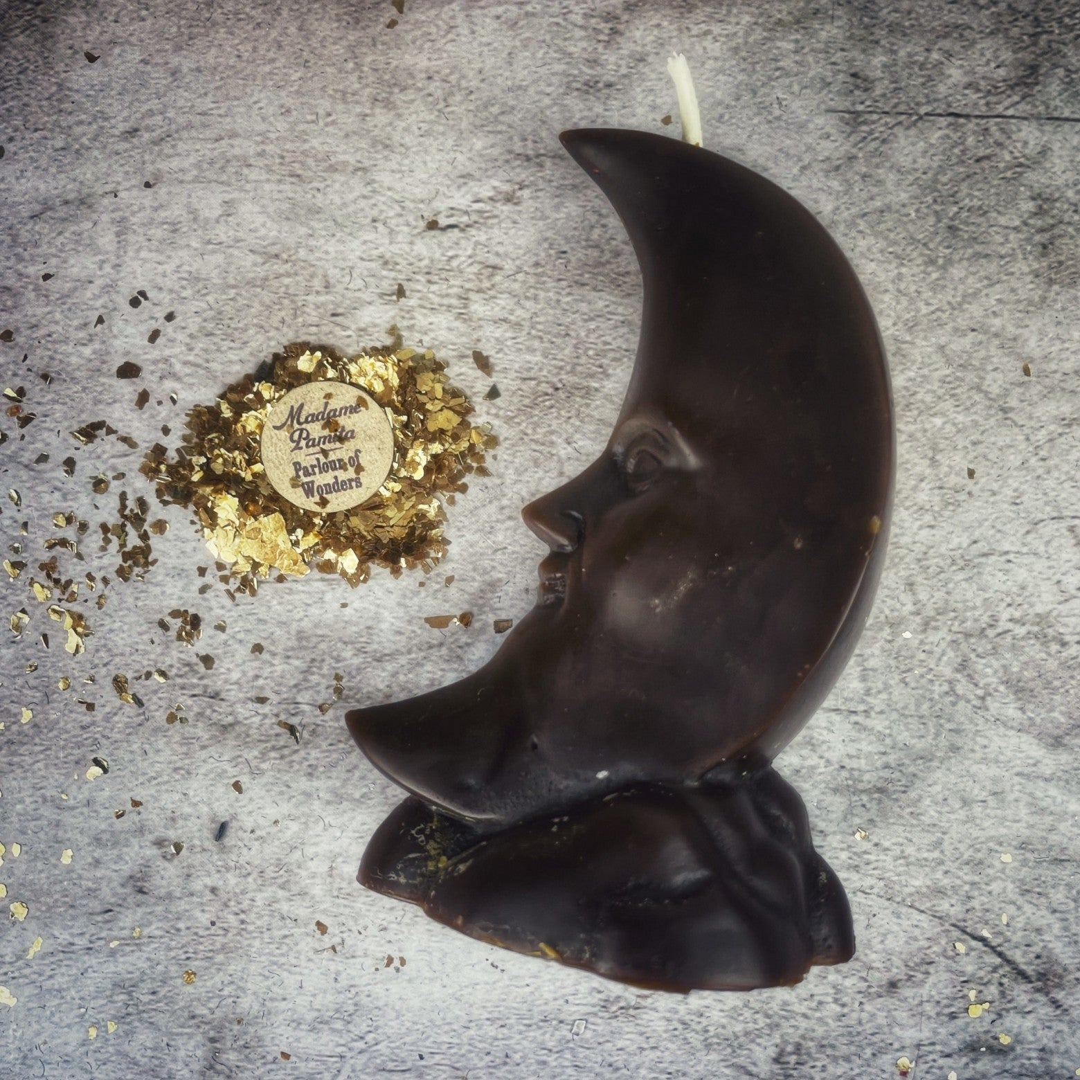 Yellow beeswax crescent moon candle by Parlour of Wonders, featuring lunar magic and manifestation symbols for spiritual rituals.