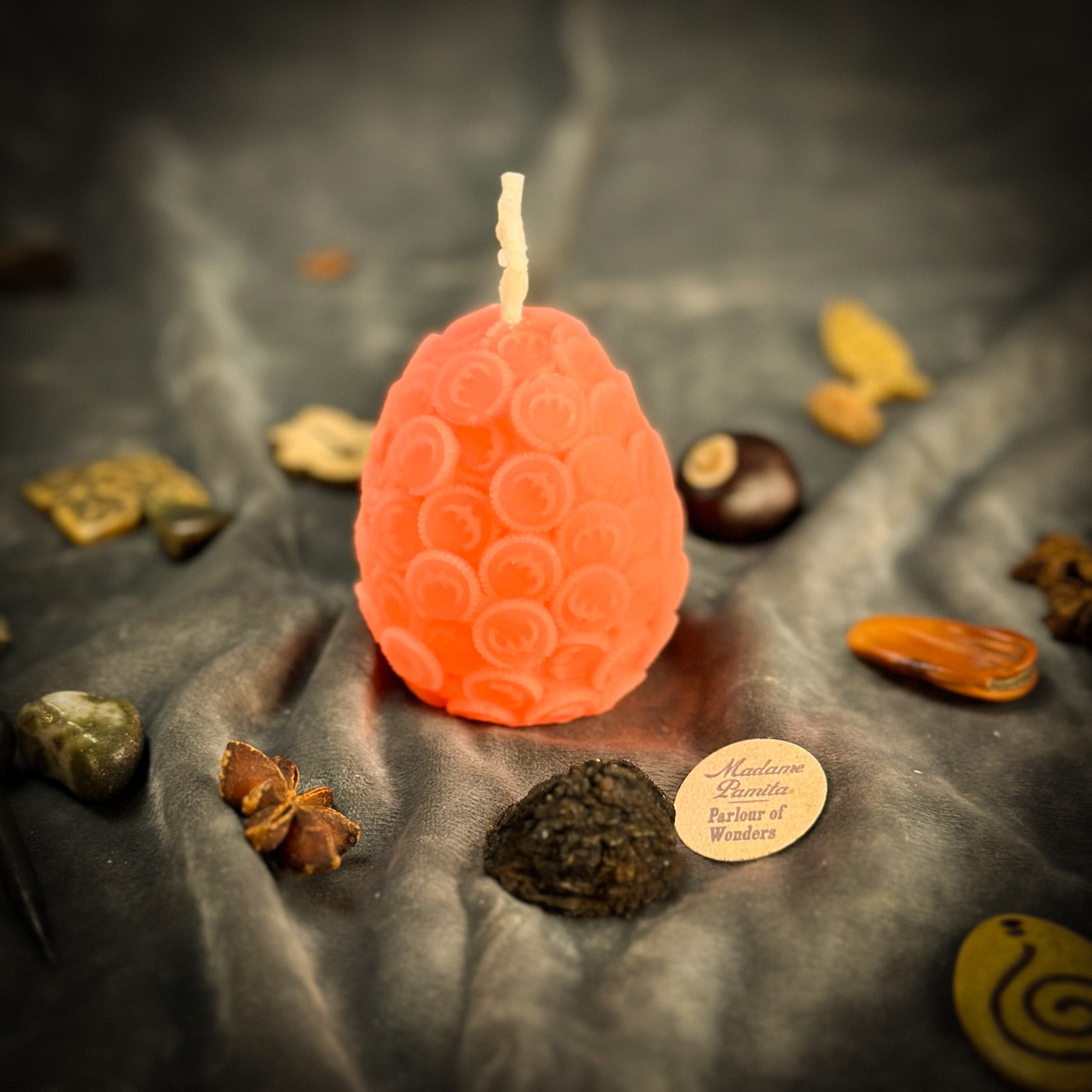 Yellow beeswax nest egg spell candle by Parlour of Wonders, symbolizing savings and financial security.