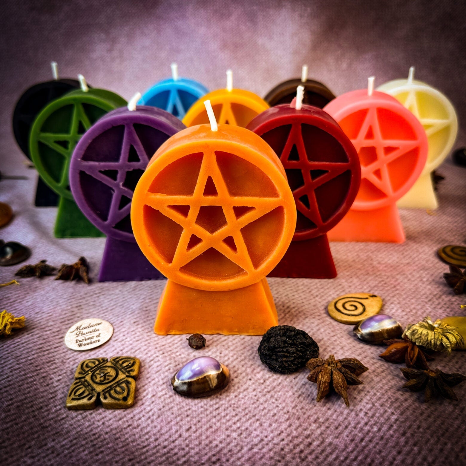 Yellow beeswax candle with pentacle design for protection, representing the five elements and spiritual safety.