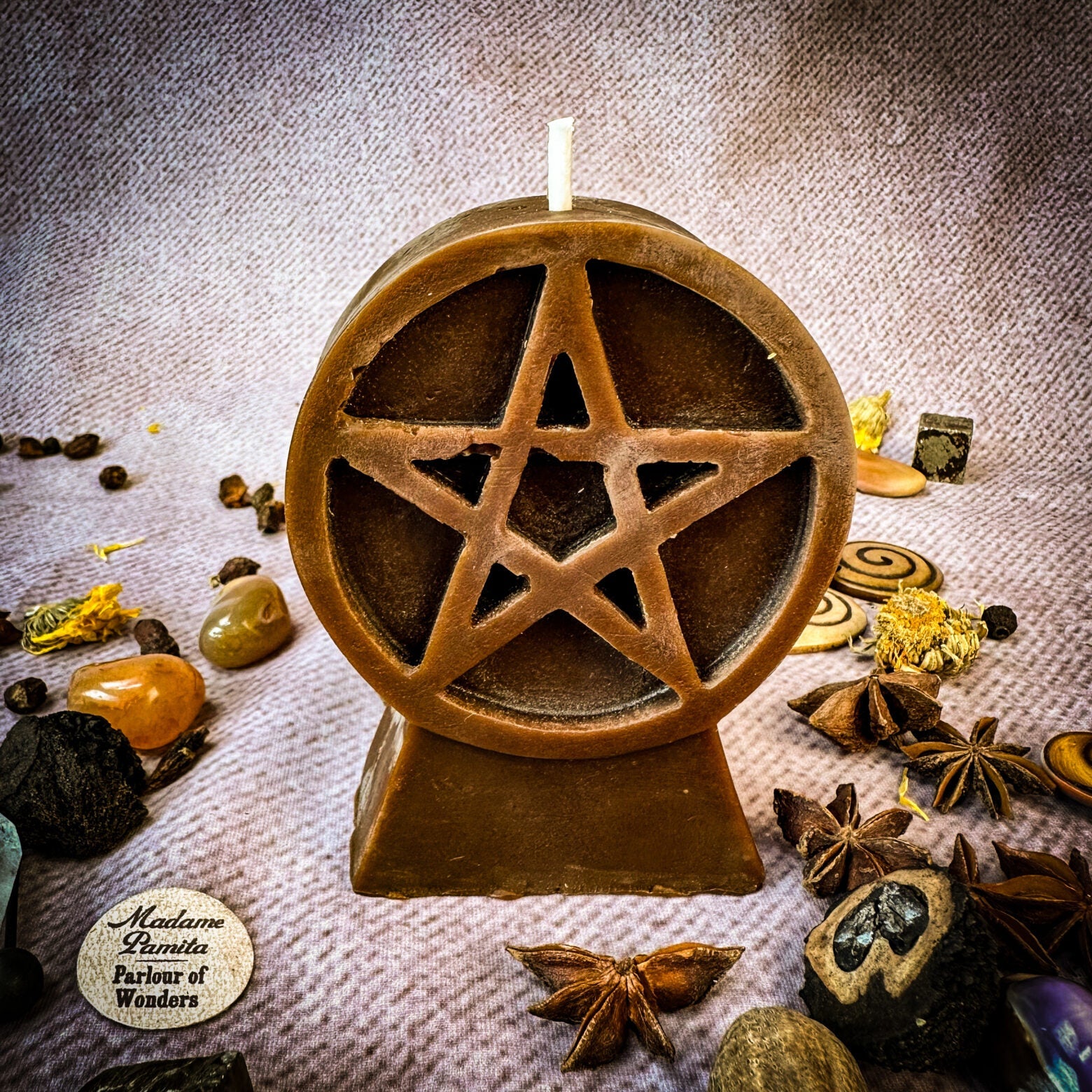 Yellow beeswax candle with pentacle symbol for protection and spiritual safety, featuring five elements design.