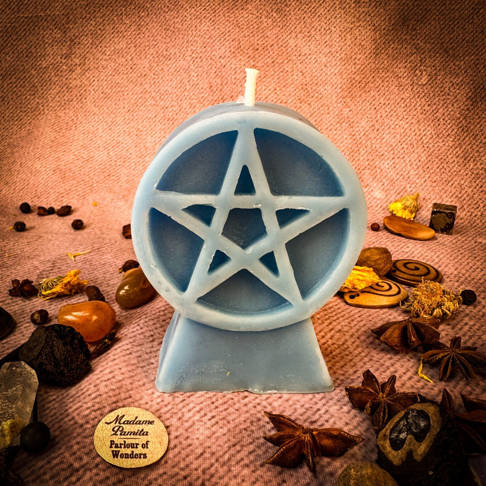Yellow beeswax candle with pentacle of protection symbol, representing five elements and spiritual safety for spiritual rituals.