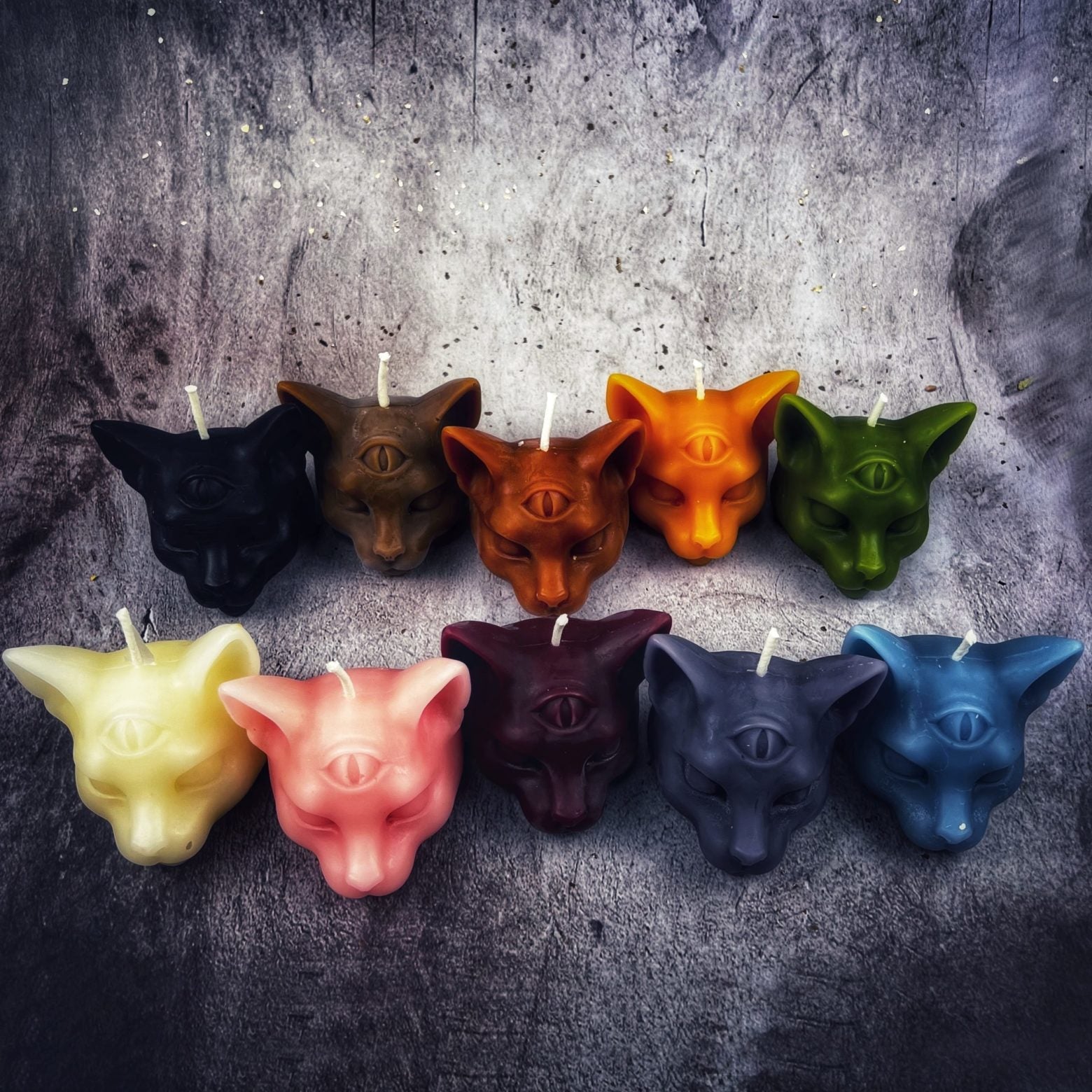 Yellow beeswax psychic cat spell candle by Parlour of Wonders, designed for intuition and clairvoyance magic.