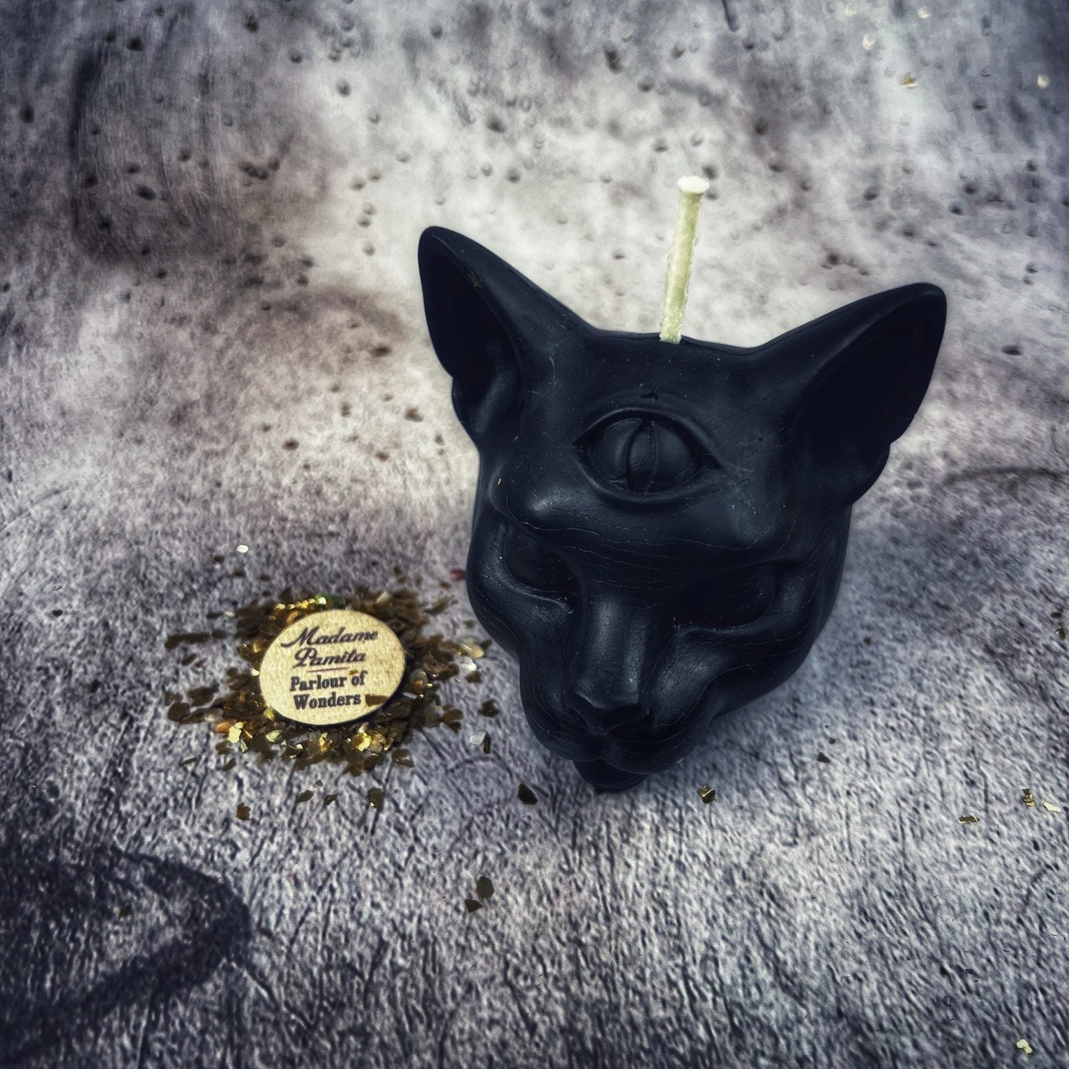 Yellow beeswax psychic cat spell candle by Parlour of Wonders, designed for intuition and clairvoyance magic.
