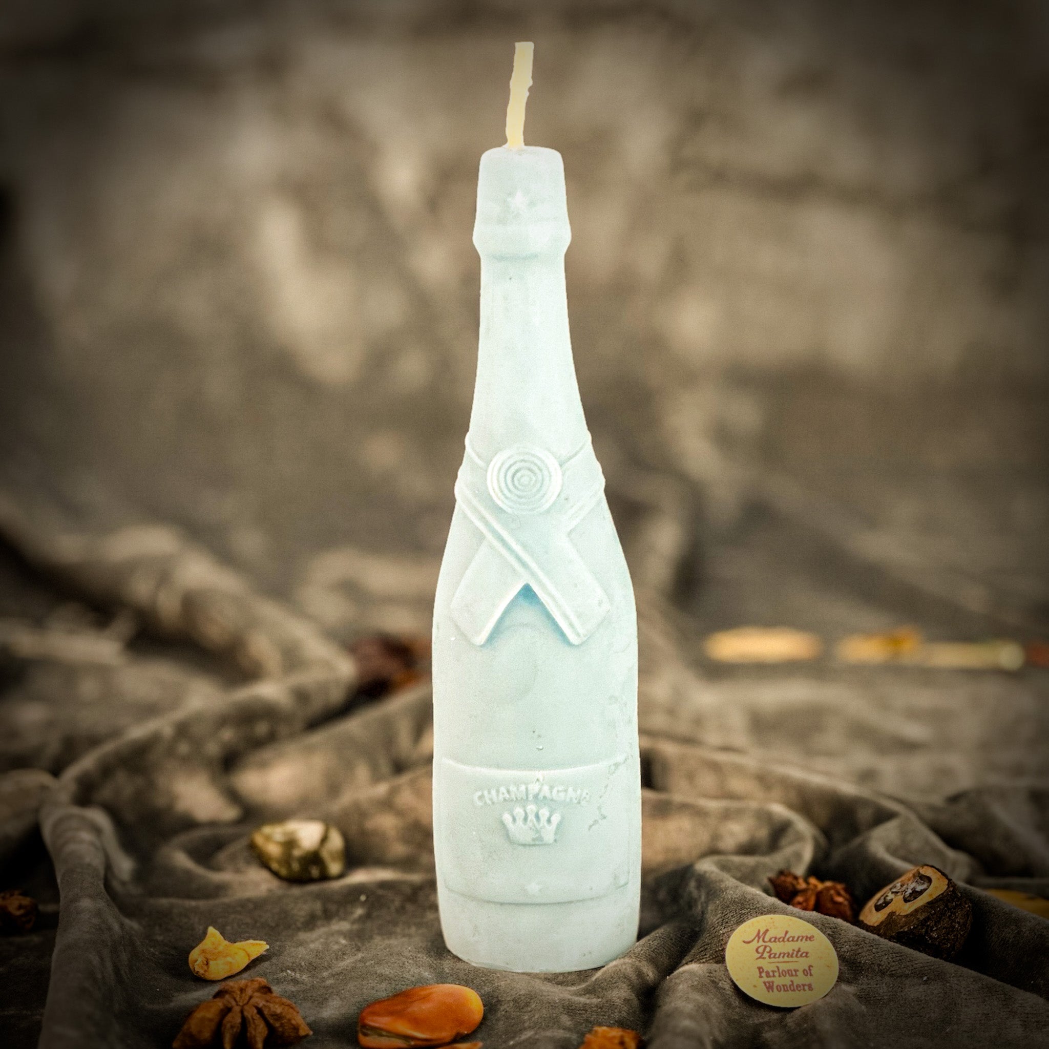 Beeswax Champagne Celebration Spell Candle by Parlour of Wonders, yellow beeswax candle for success and luxury manifestation.