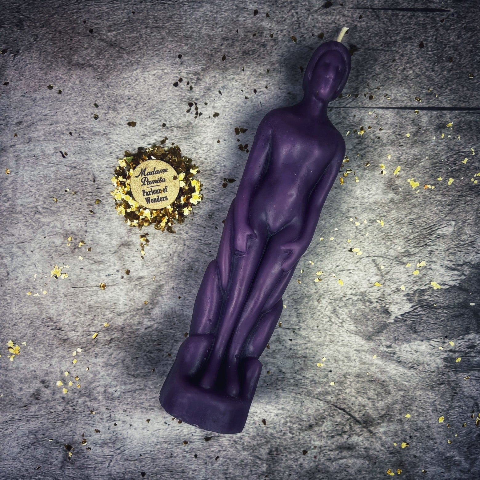 Beeswax human figural spell candle by Parlour of Wonders for personal empowerment and intention magic, shown in yellow wax.