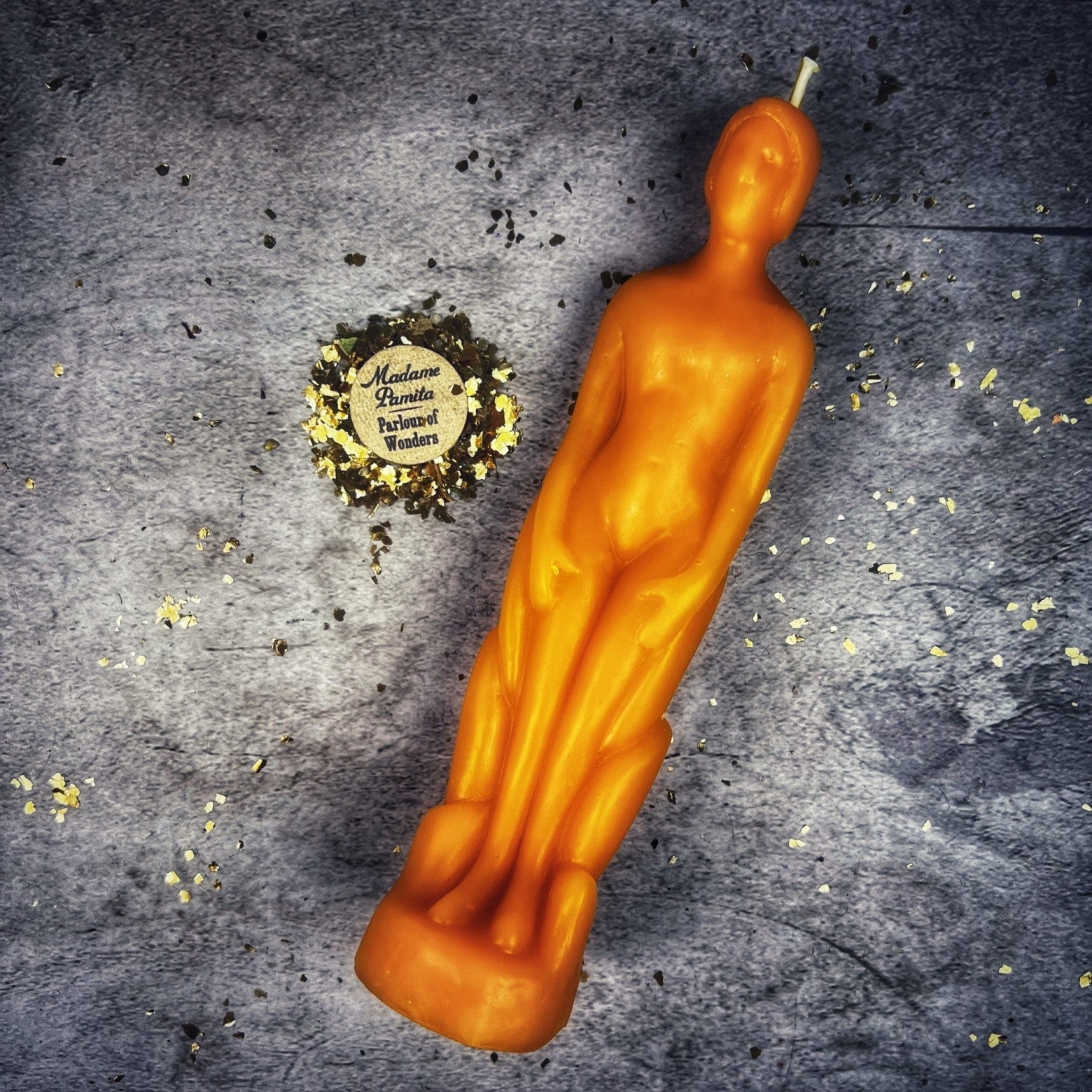 Yellow beeswax human figural spell candle by Parlour of Wonders for personal empowerment and intention magic.