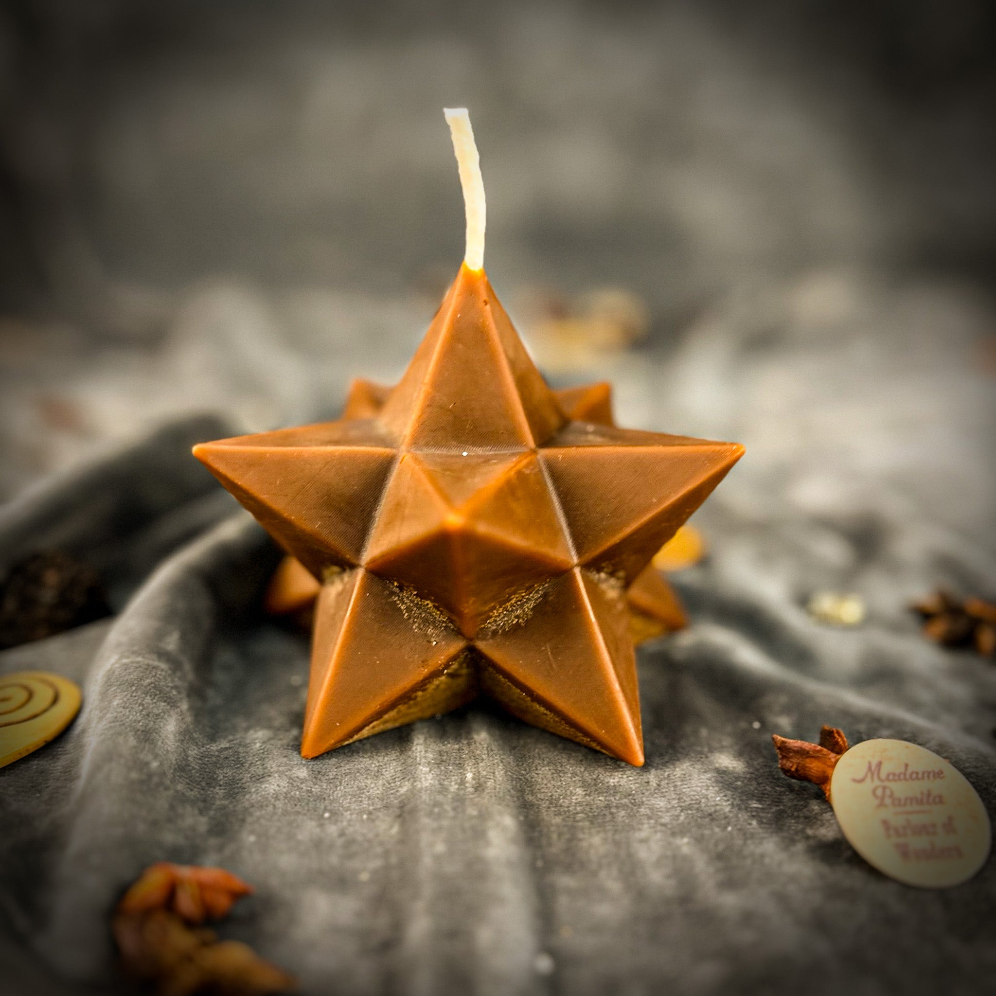 Yellow beeswax candle featuring a pentagram and merkaba design, representing protection, ascension, and sacred geometry.