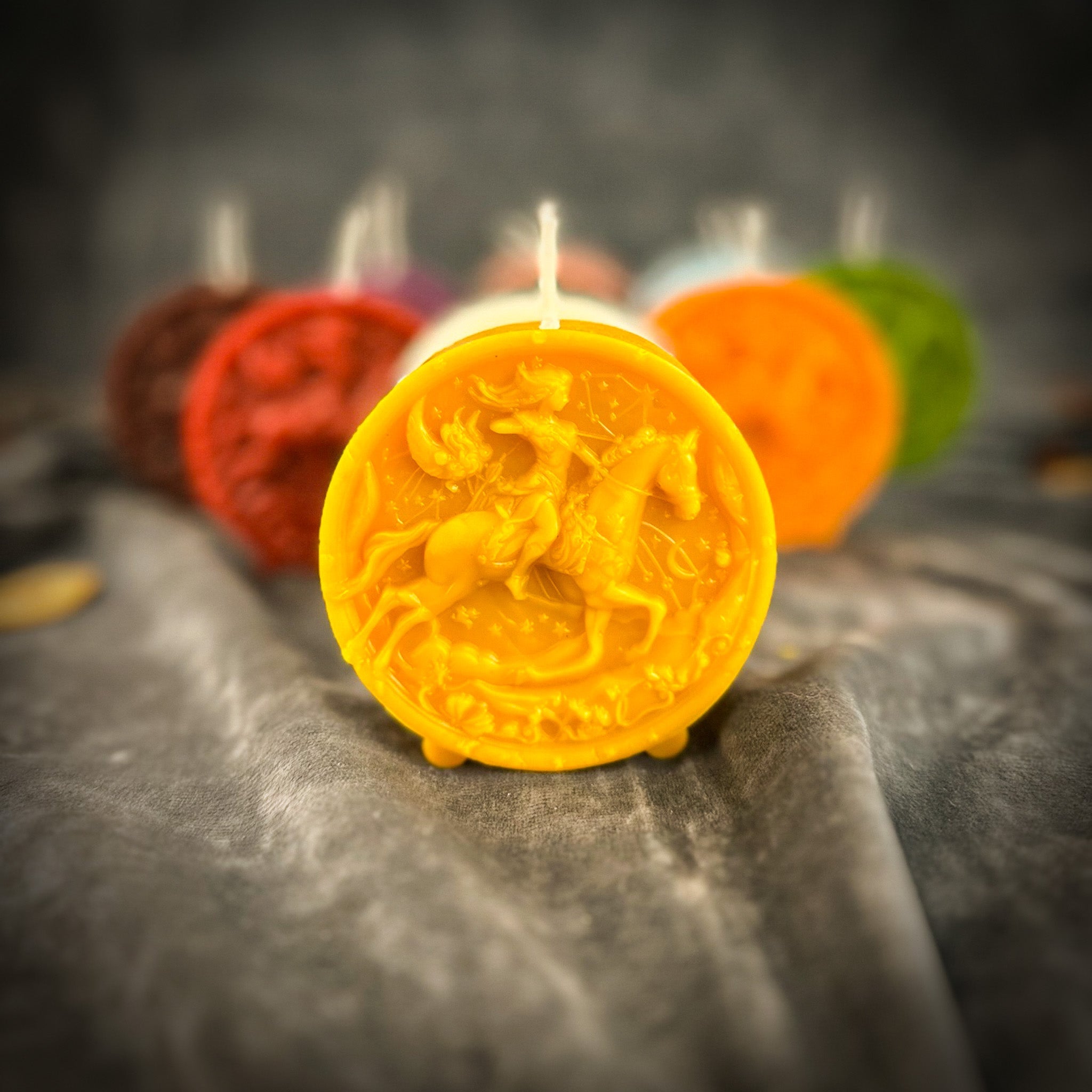 Yellow beeswax Sagittarius Archer zodiac spell candle by Parlour of Wonders, featuring a detailed archer design for adventure and wisdom.
