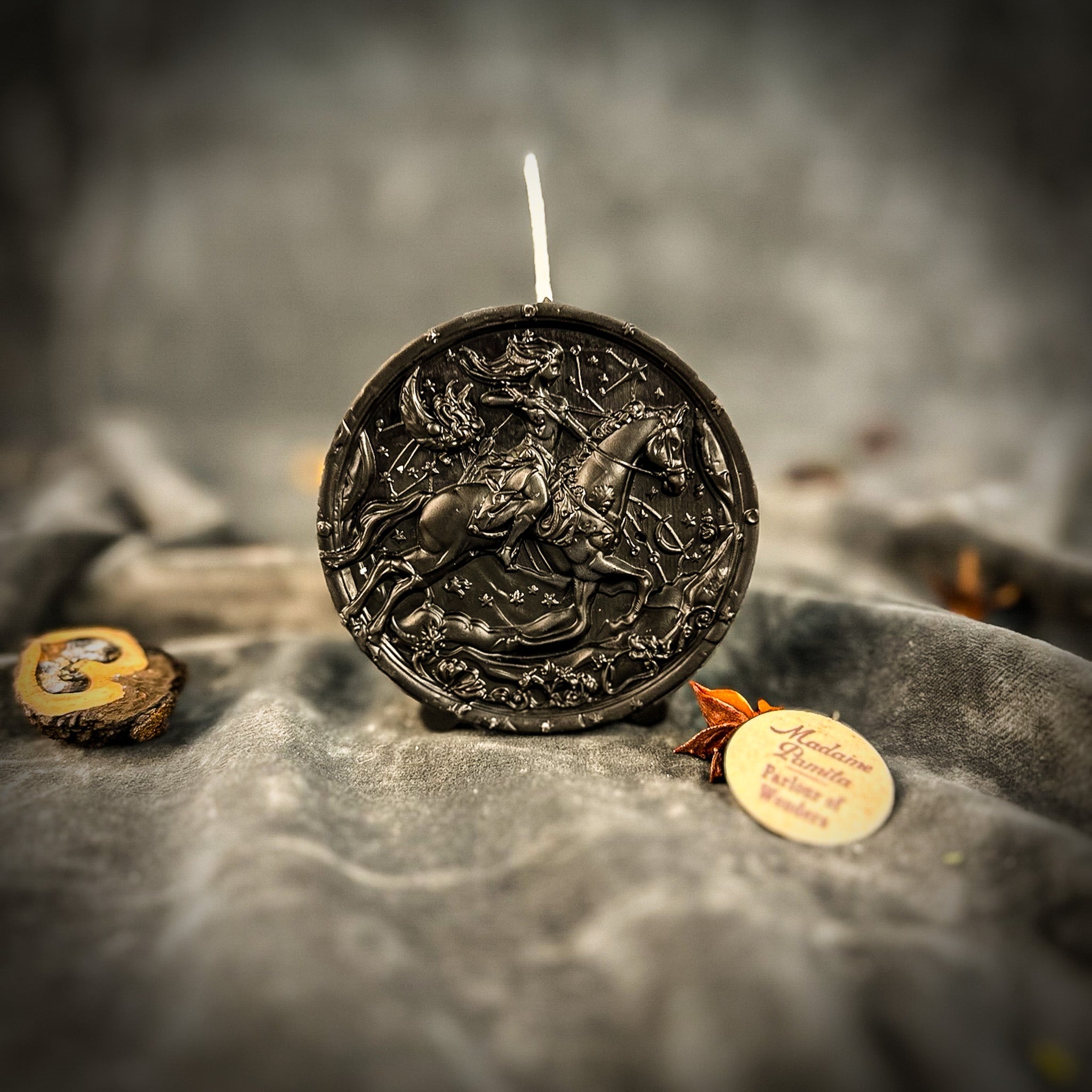 Yellow beeswax Sagittarius Archer zodiac spell candle by Parlour of Wonders, featuring a detailed archer design for adventure and wisdom.