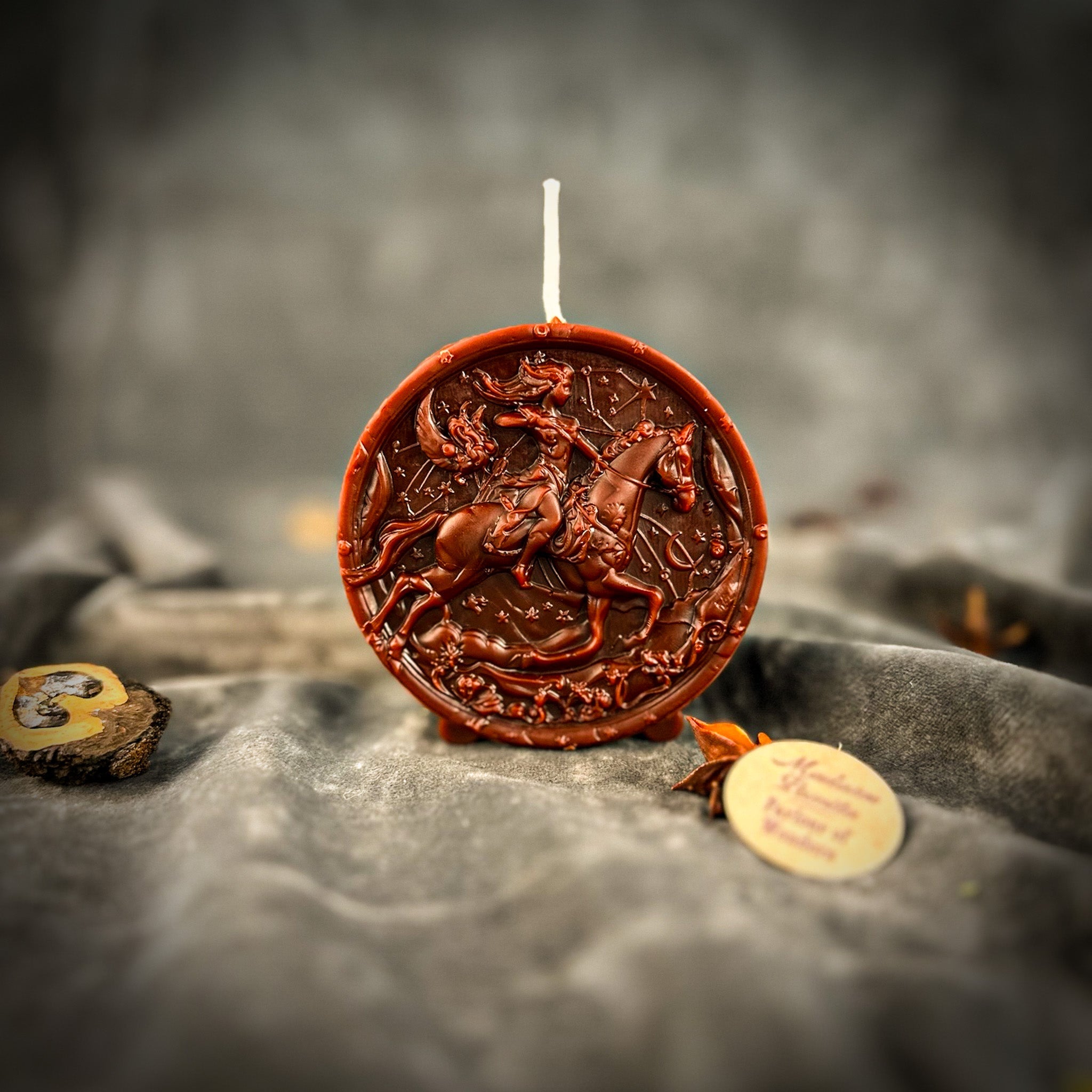 Yellow beeswax Sagittarius Archer zodiac spell candle by Parlour of Wonders, featuring a detailed archer design representing adventure and wisdom.