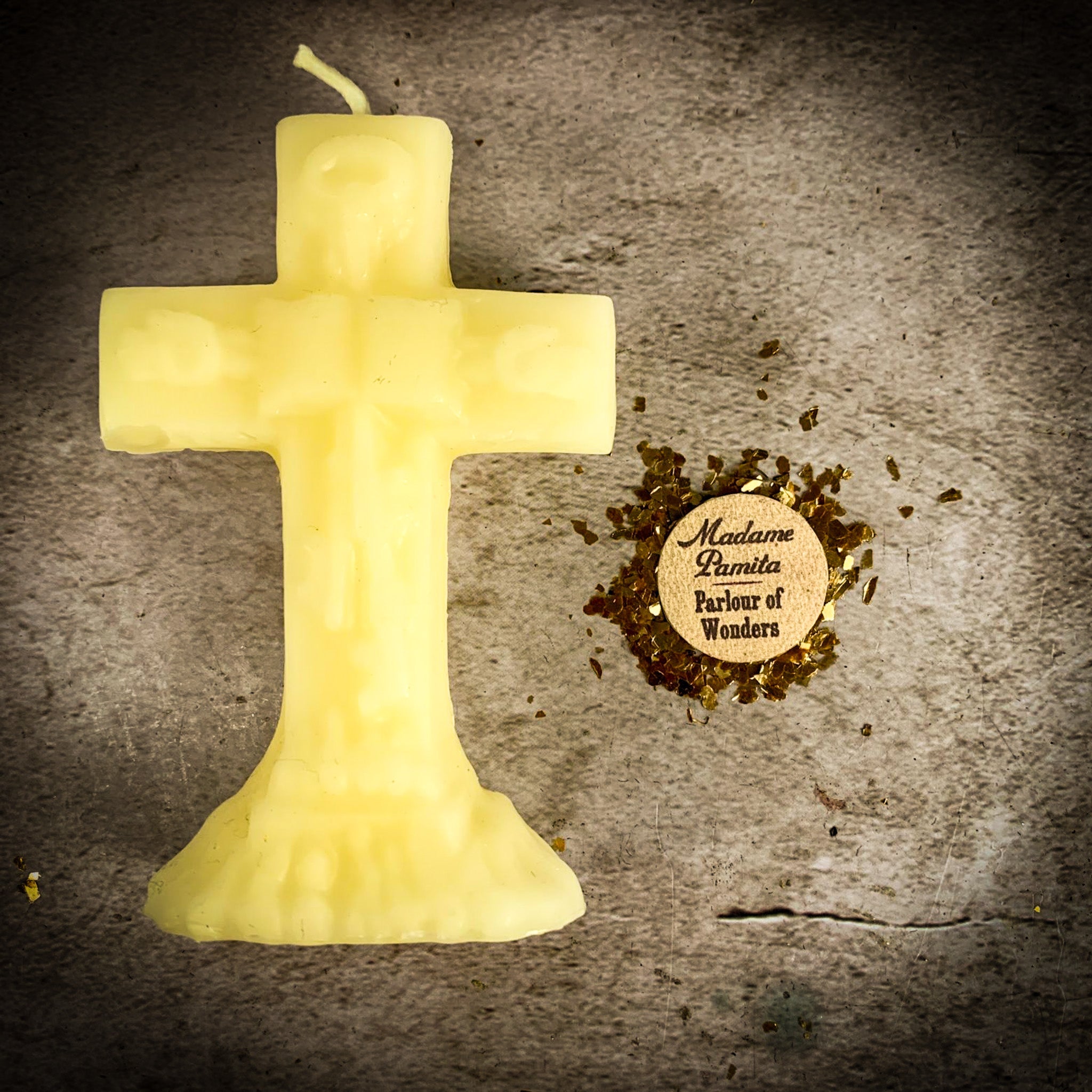 Yellow beeswax uncrossing spell candle by Parlour of Wonders, used to remove hexes, curses, and jinxes.