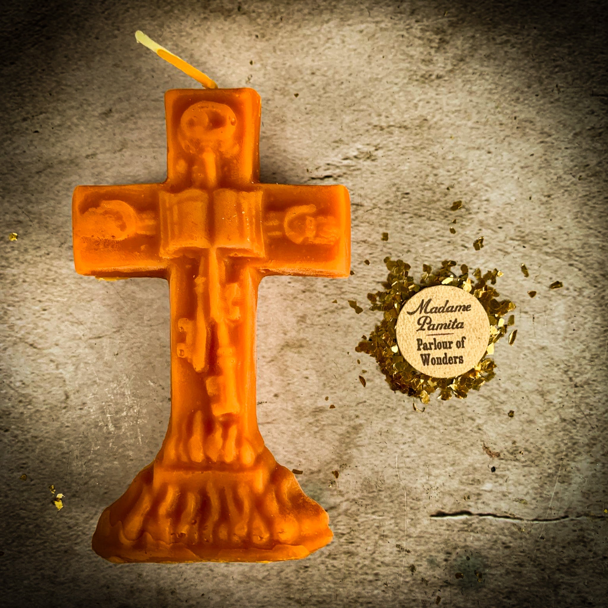 Yellow beeswax candle from Parlour of Wonders for uncrossing spells to remove hexes, curses, and jinxes.