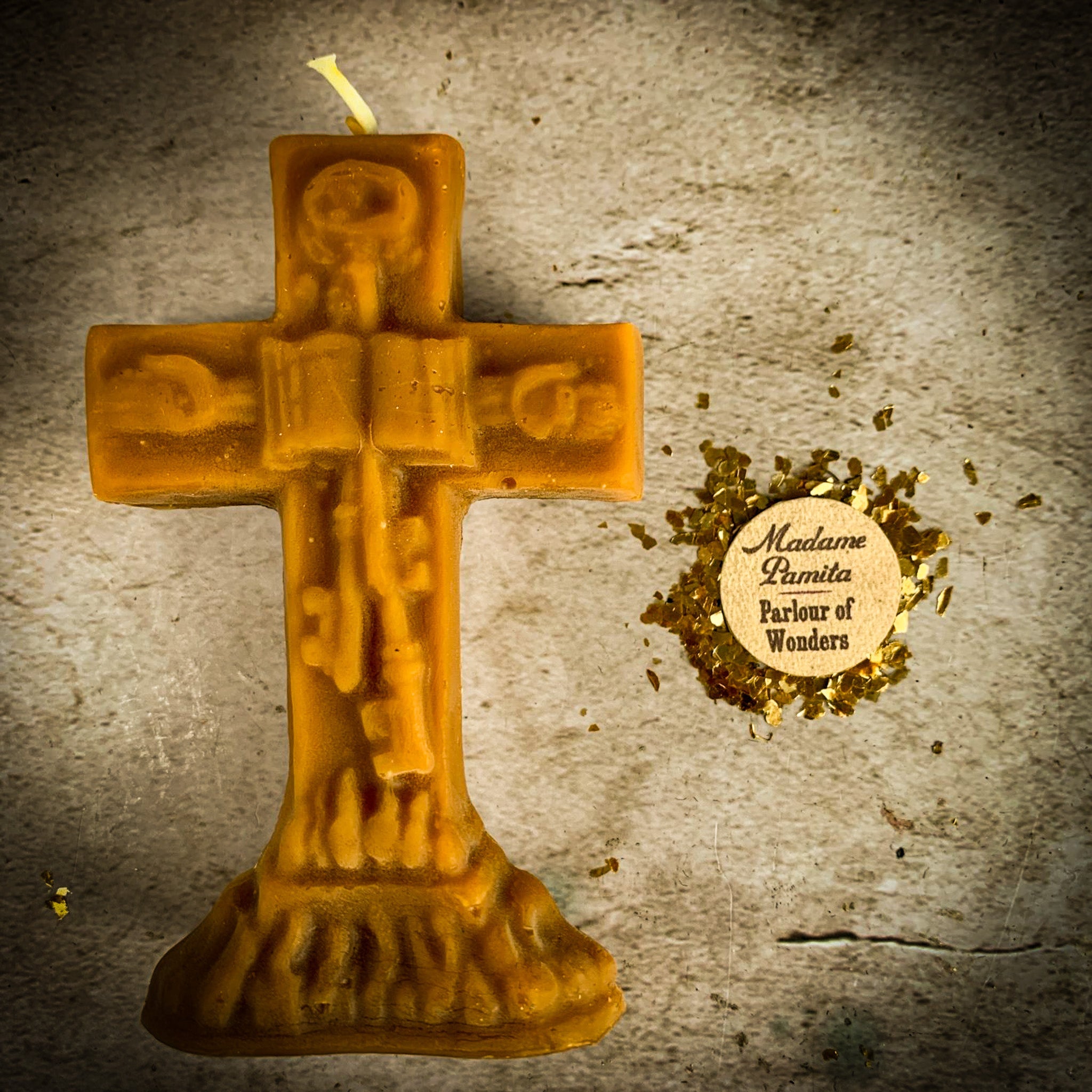 Yellow beeswax candle from Parlour of Wonders designed for uncrossing spells to remove hexes, curses, and jinxes.