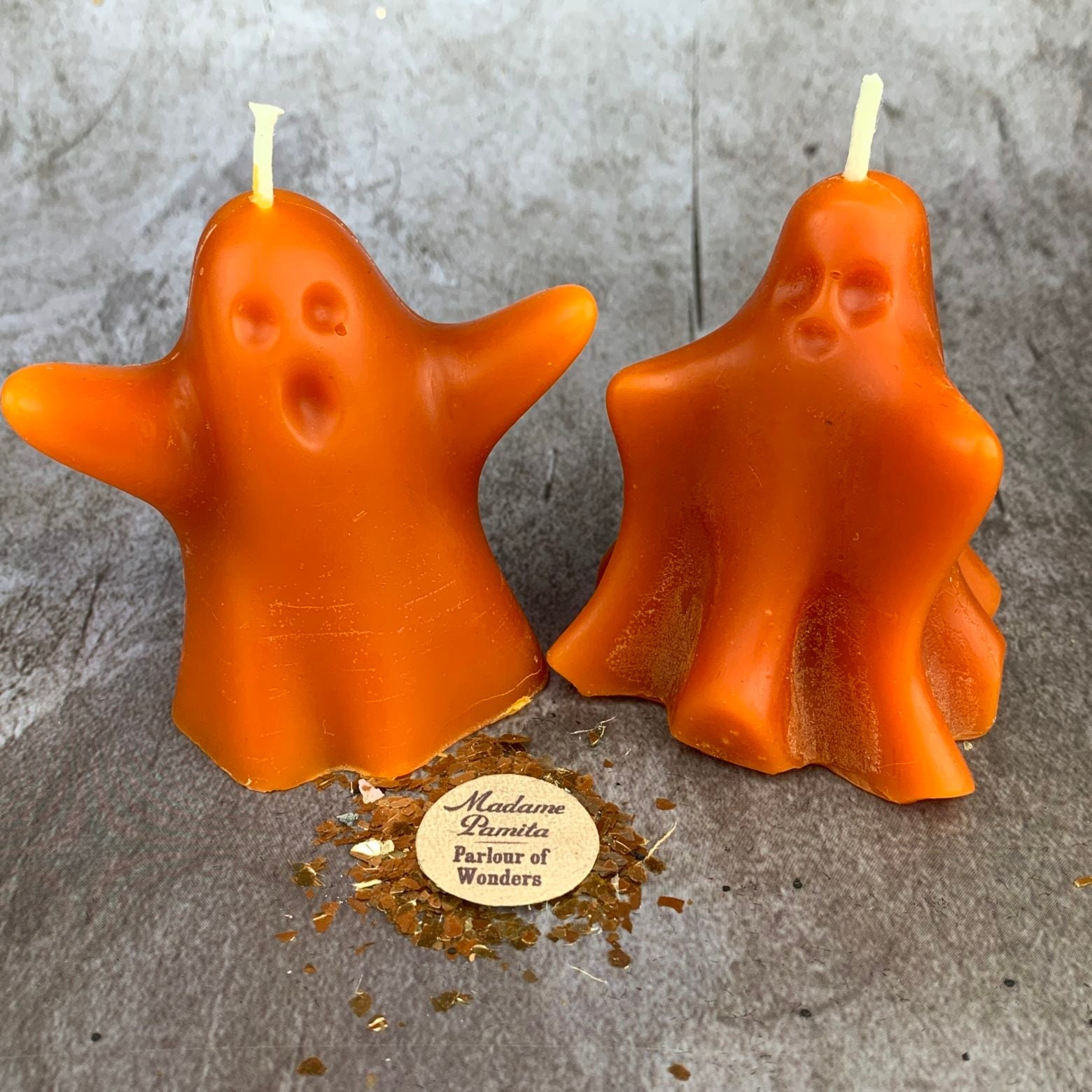Set of yellow beeswax wishing ghost candles for spirit guide and ancestor magic by Parlour of Wonders, featuring ghost-shaped candles.