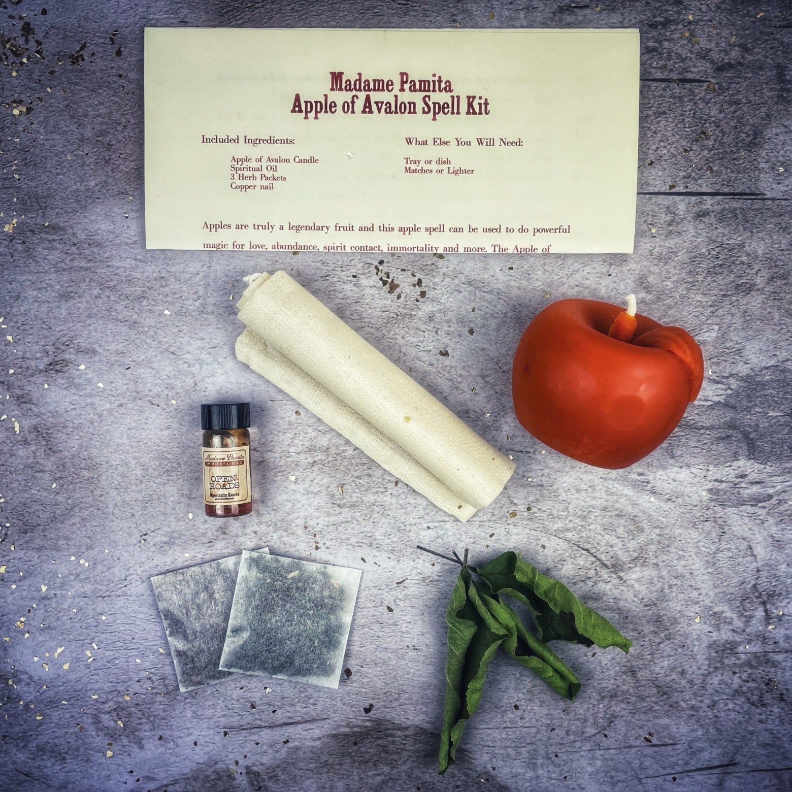 Parlour of Wonders Apple of Avalon Candle Spell Kit with black candles and mystical symbols for love, abundance, and ancient magic.
