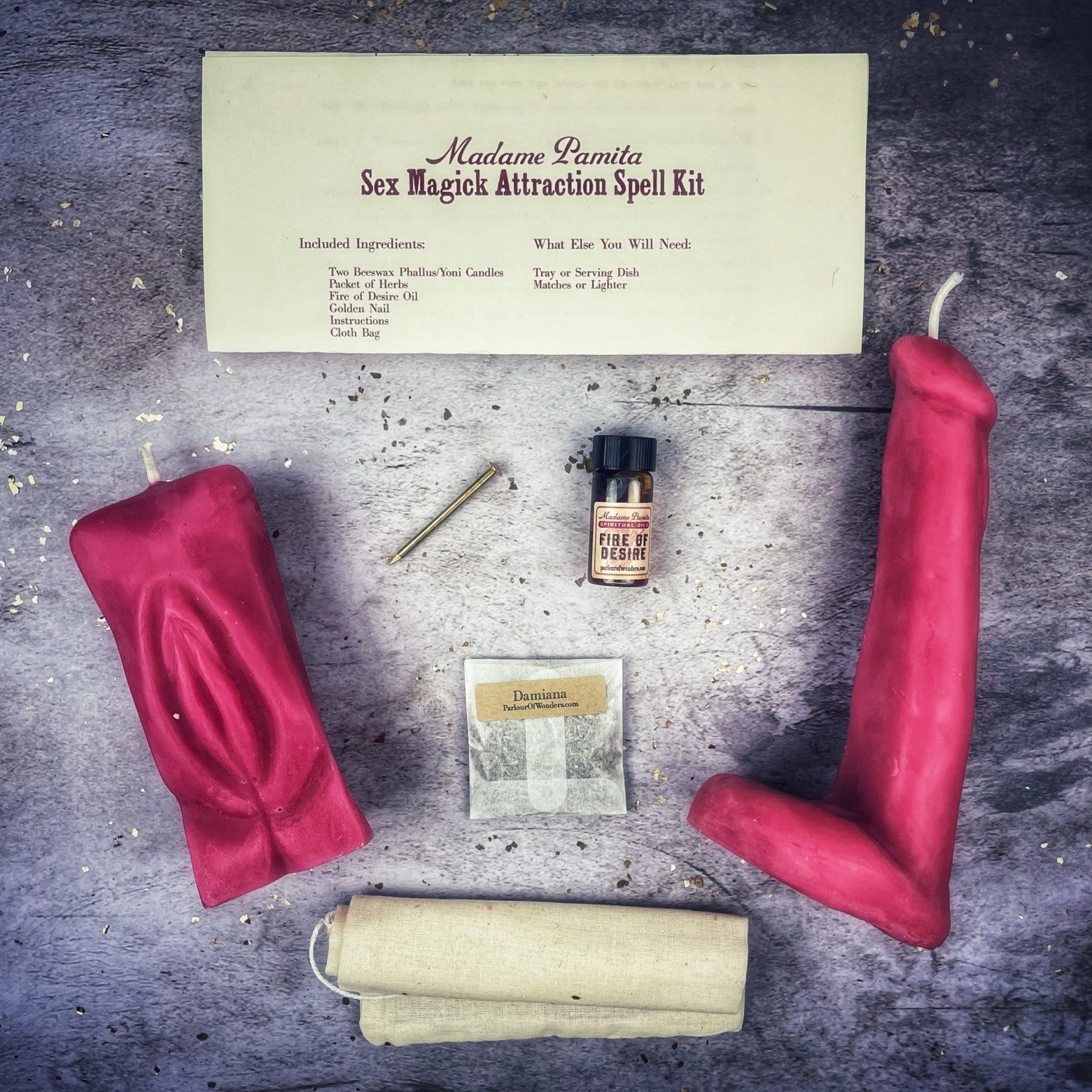 Black candle spell kit by Parlour of Wonders featuring yoni and phallus symbols for passion and attraction magic.