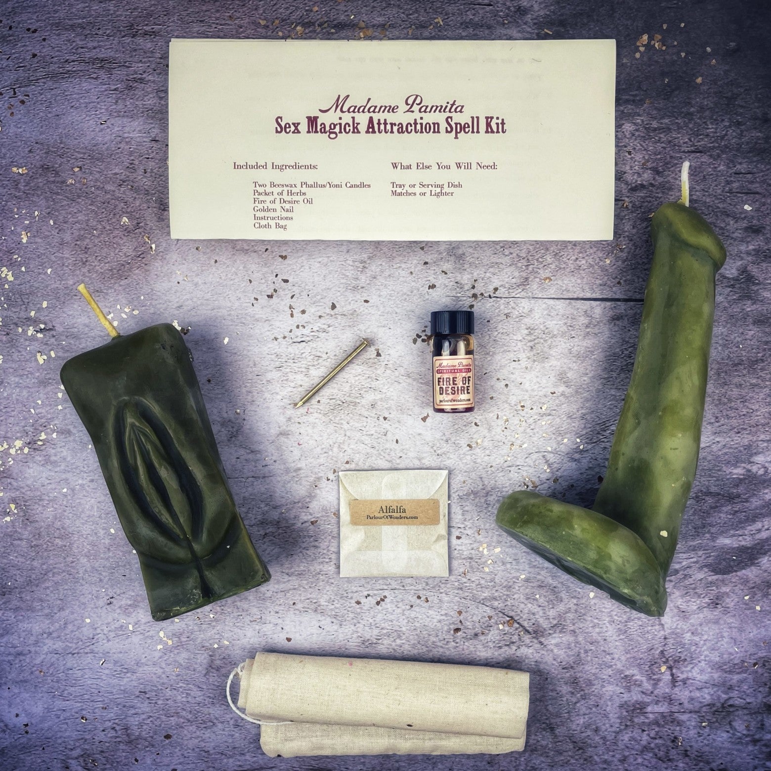 Black candle spell kit with yoni and phallus symbols for passion and attraction, designed for sex magick rituals by Parlour of Wonders.