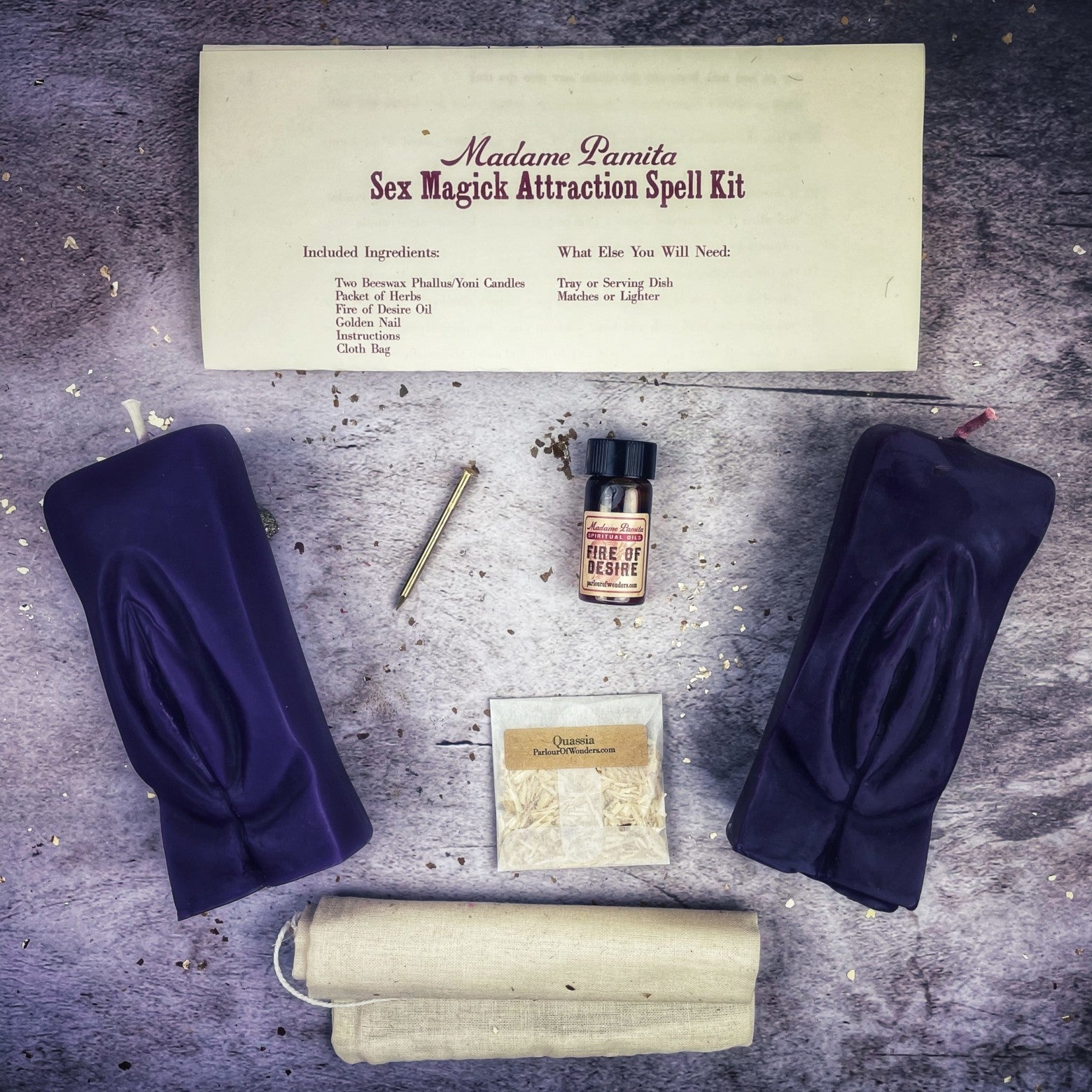 Black candle spell kit by Parlour of Wonders for passion and desire, featuring a Yoni-themed candle and ritual accessories.