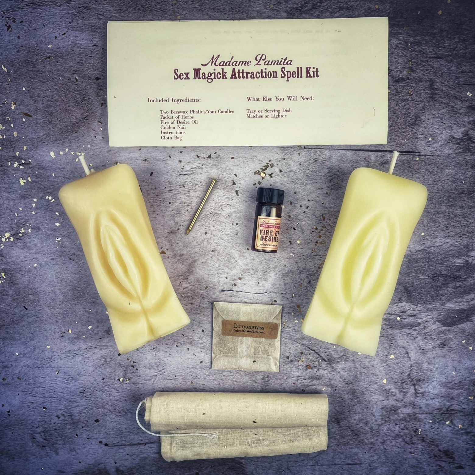 Black candle spell kit by Parlour of Wonders for passion and desire, featuring a Yoni-themed candle and ritual accessories.