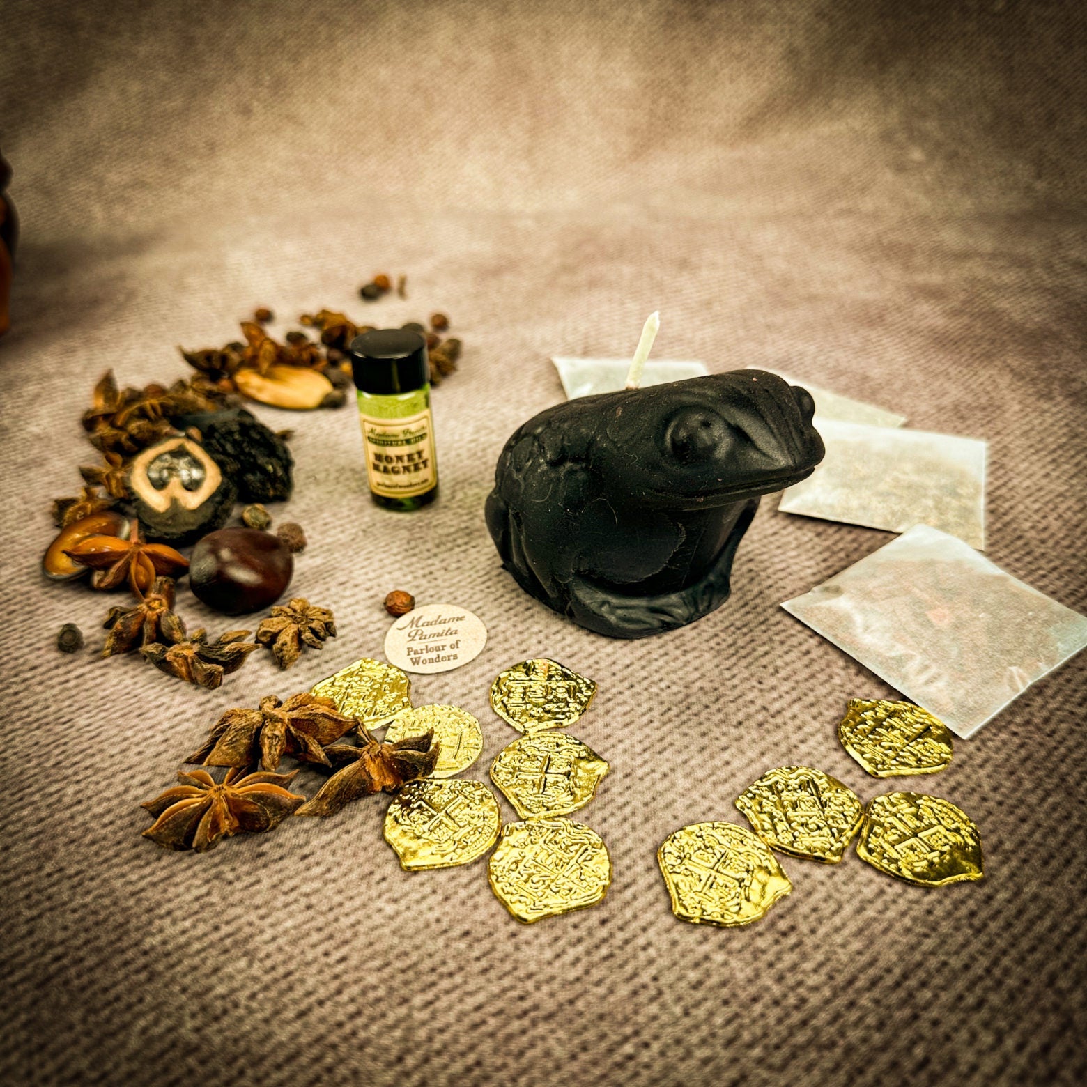 Black Lucky Money Frog Candle Spell Kit by Parlour of Wonders for abundance and prosperity magic, featuring candles and spell components.