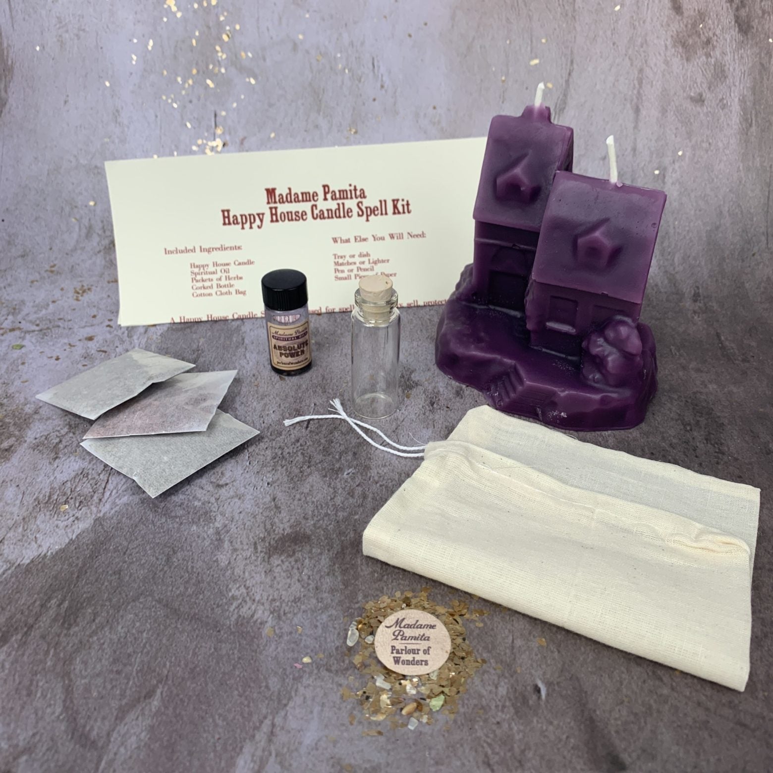Parlour of Wonders Happy House Candle Spell Kit with black candles, herbs, and tools for home protection, harmony, and blessings.