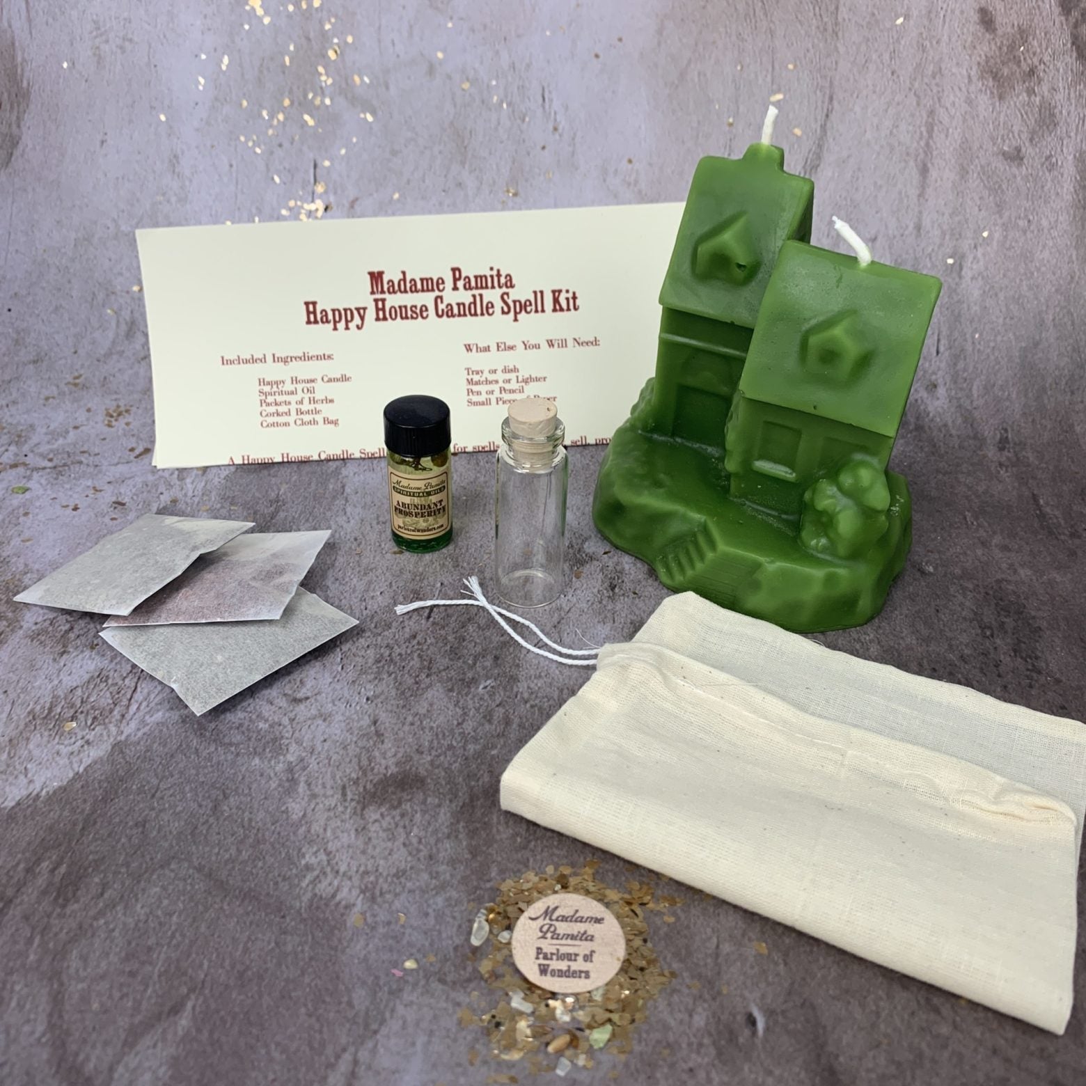 Parlour of Wonders Happy House Candle Spell Kit for protection, harmony, and blessings, featuring black candles and ritual tools.
