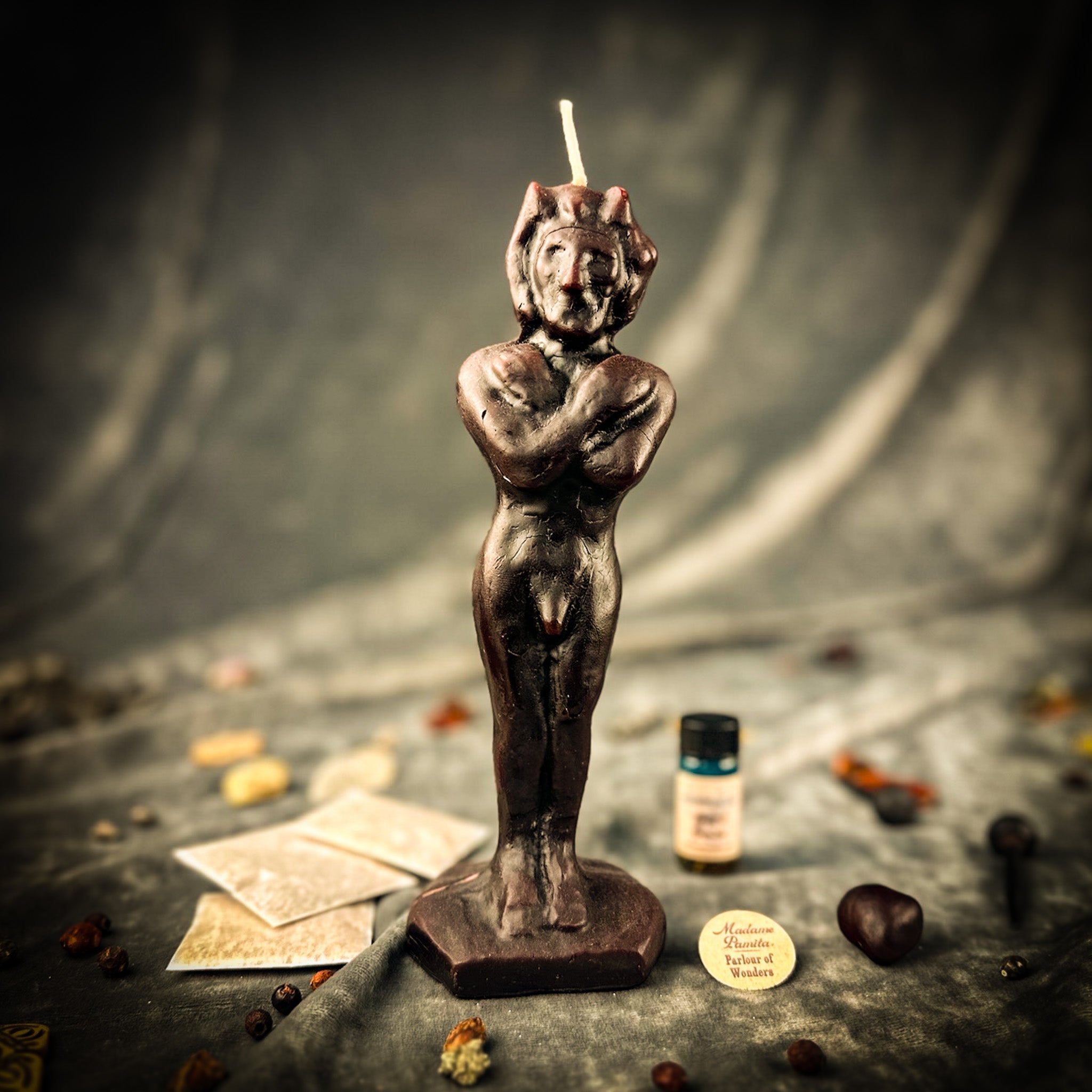 Parlour of Wonders Pan God of the Wild Candle Spell Kit with brown grounding candles and symbols representing wild nature and divine sexuality.