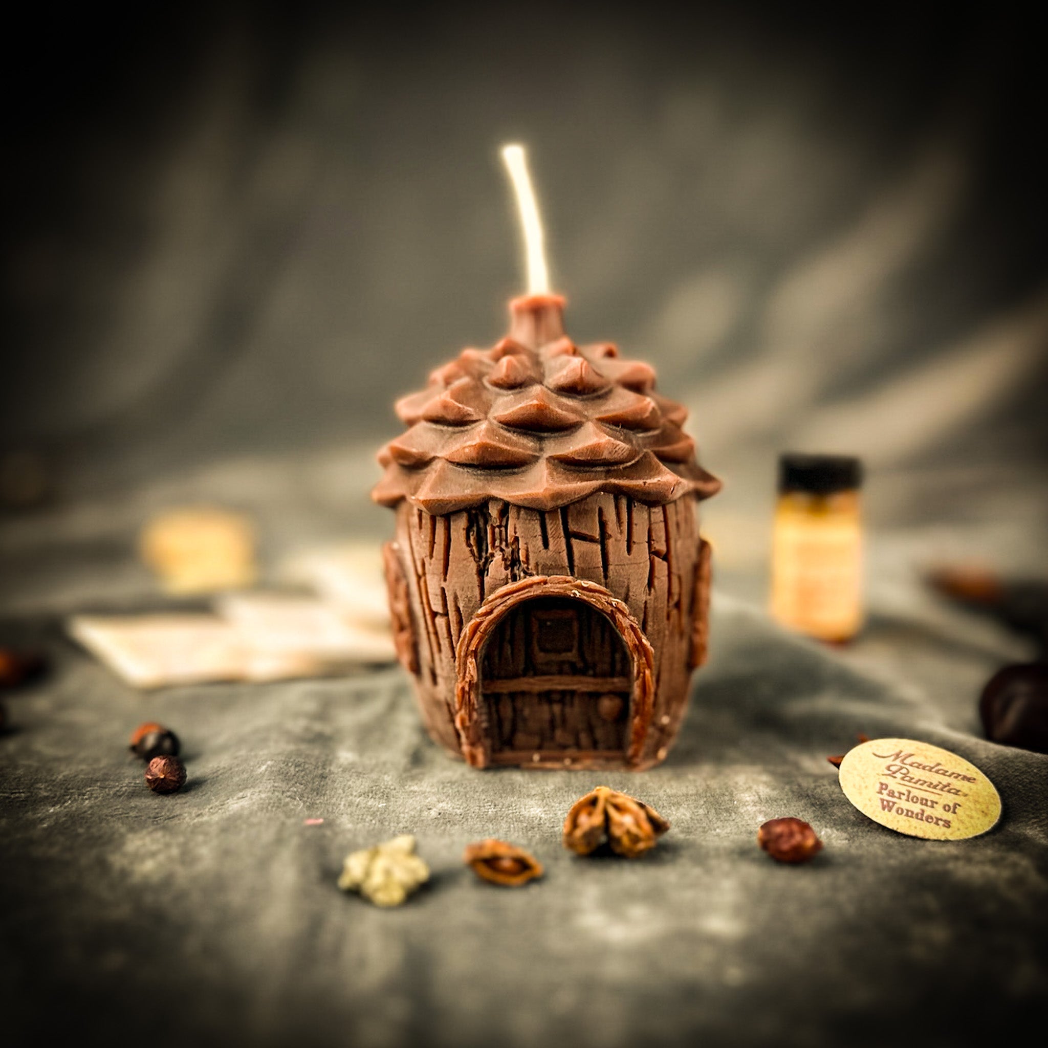 Parlour of Wonders Pinecone of Protection Candle Spell Kit with fairy magic and guardian energy, includes candles and grounding elements.