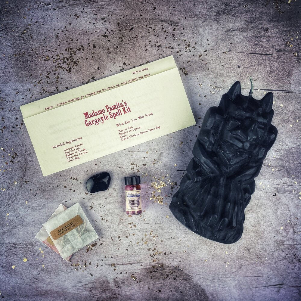 Parlour of Wonders Gargoyle Protection Candle Spell Kit with brown candles and magical symbols for guardian protection and legal matters.