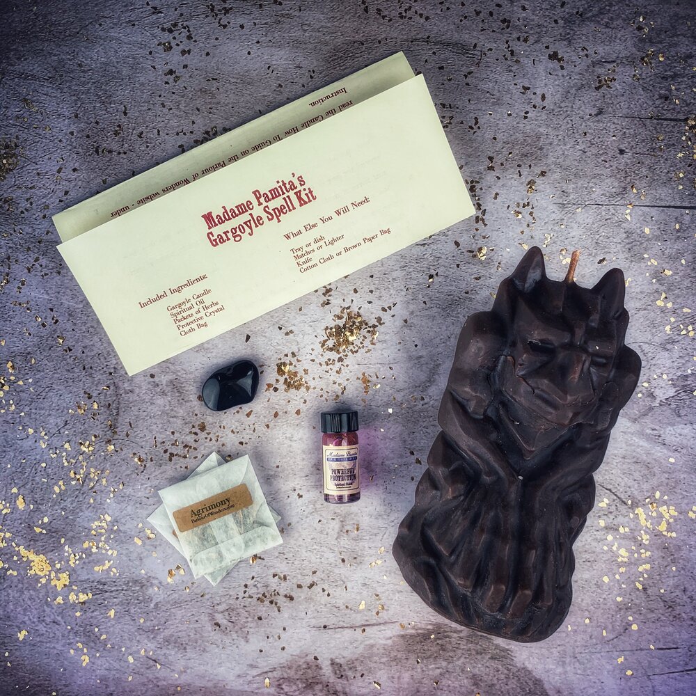 Parlour of Wonders Gargoyle Protection Candle Spell Kit with brown candles and protective symbols for guardian magic and legal matters.