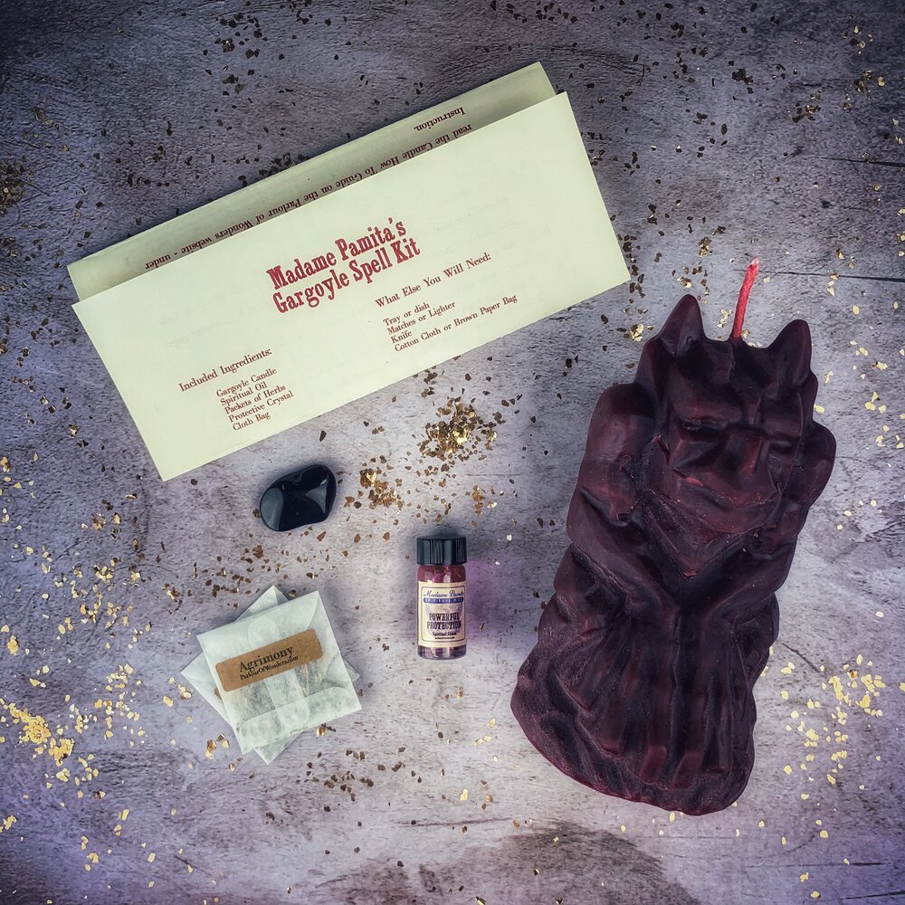 Parlour of Wonders Gargoyle Protection Candle Spell Kit with brown candles and magical symbols for guardian protection and legal matters.