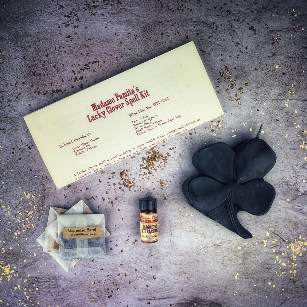 Green Lucky Clover Candle Spell Kit by Parlour of Wonders with candles and herbs for good fortune and luck spells.