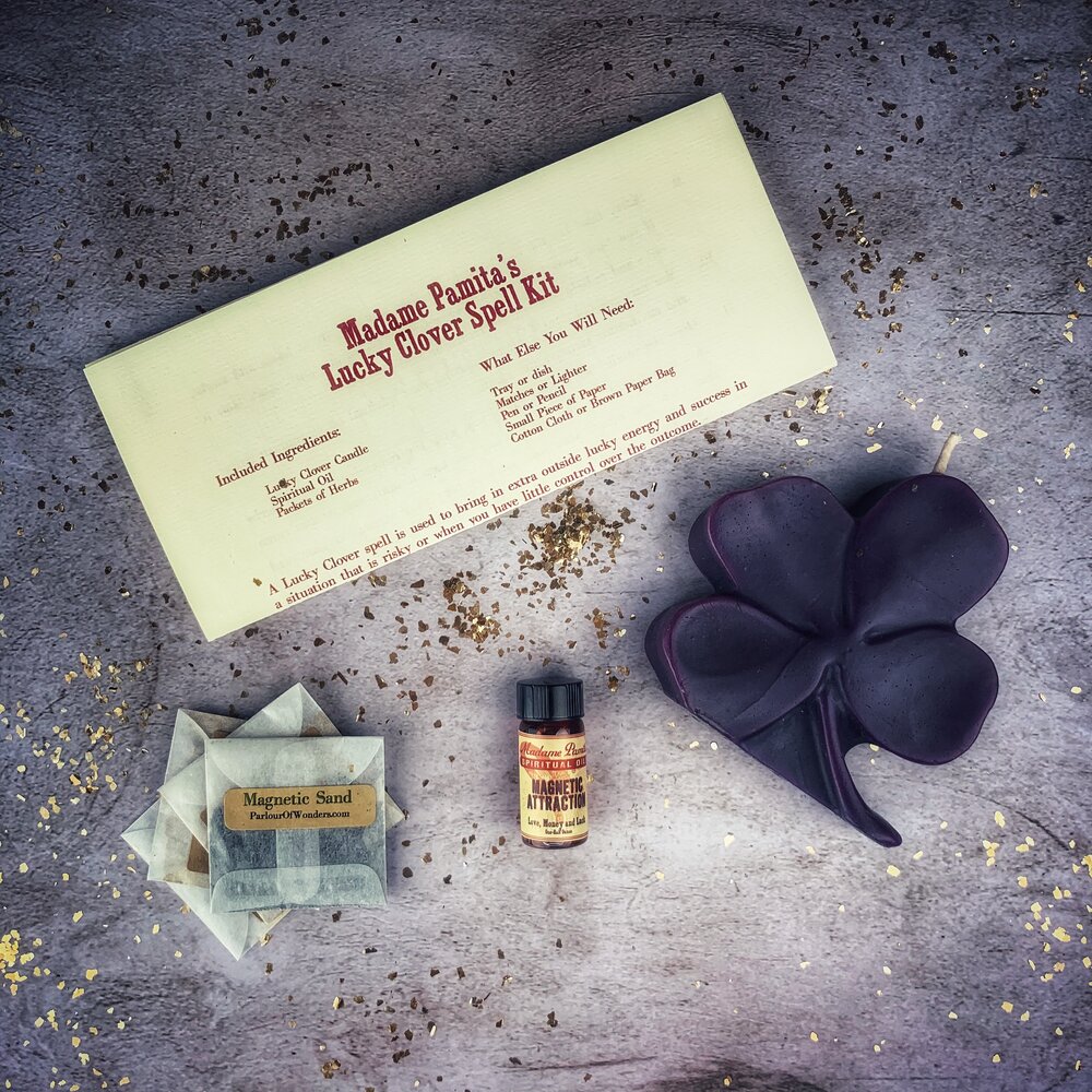 Green Lucky Clover Candle Spell Kit by Parlour of Wonders, featuring candles and herbs for good fortune and luck.