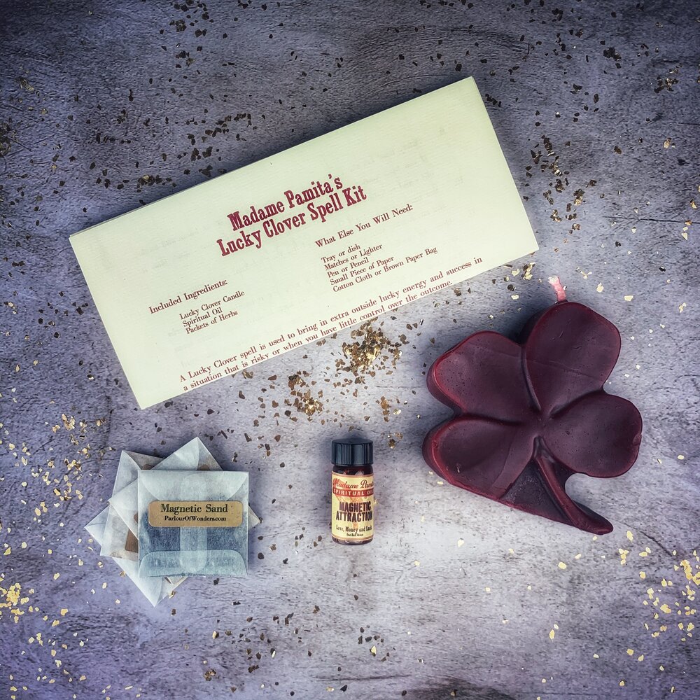 Green Candle Spell Kit with lucky clover symbols by Parlour of Wonders for good fortune and lucky breaks.
