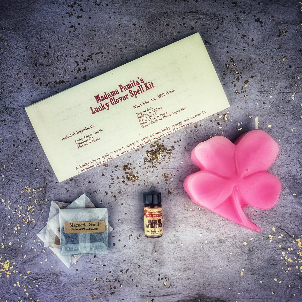Green Lucky Clover Candle Spell Kit by Parlour of Wonders featuring candles and herbs for good fortune and luck.
