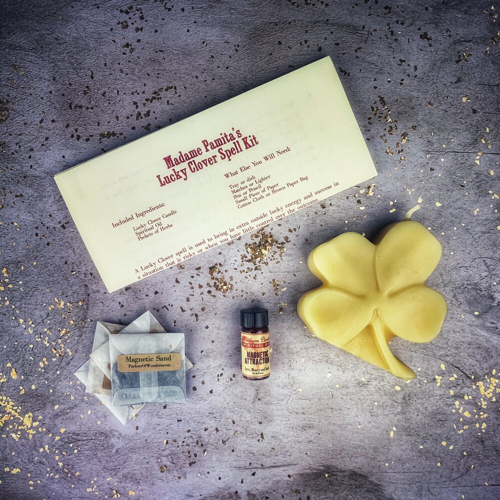 Green Lucky Clover Candle Spell Kit by Parlour of Wonders with candles and ritual items for good fortune and luck.