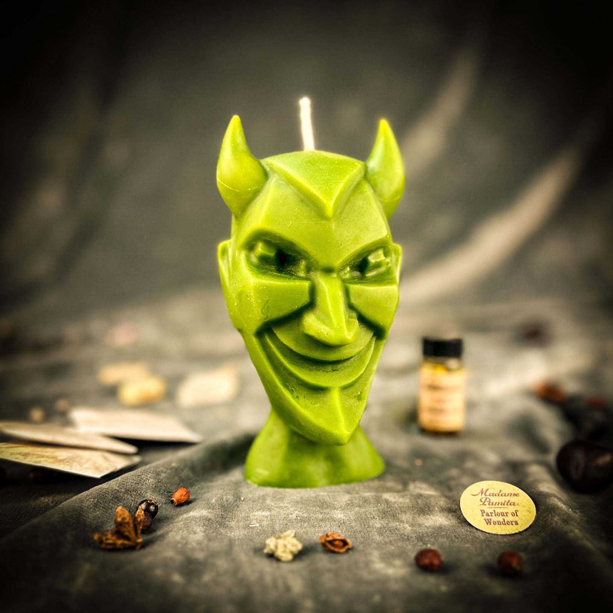 Green Candle Spell Kit by Parlour of Wonders for banishing evil or invoking trickster magic, includes candles and ritual tools.