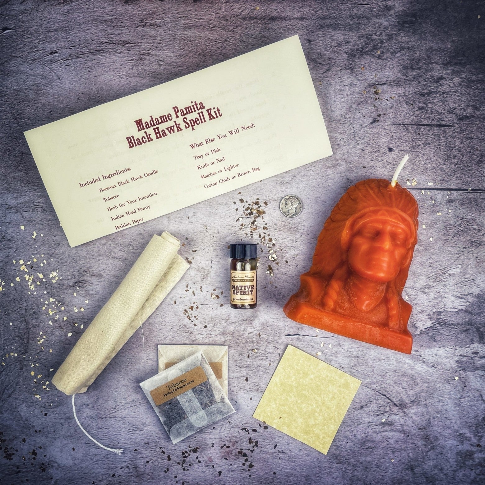 Black Hawk Justice Candle Spell Kit by Parlour of Wonders featuring a black candle and spirit guide for social justice magic.