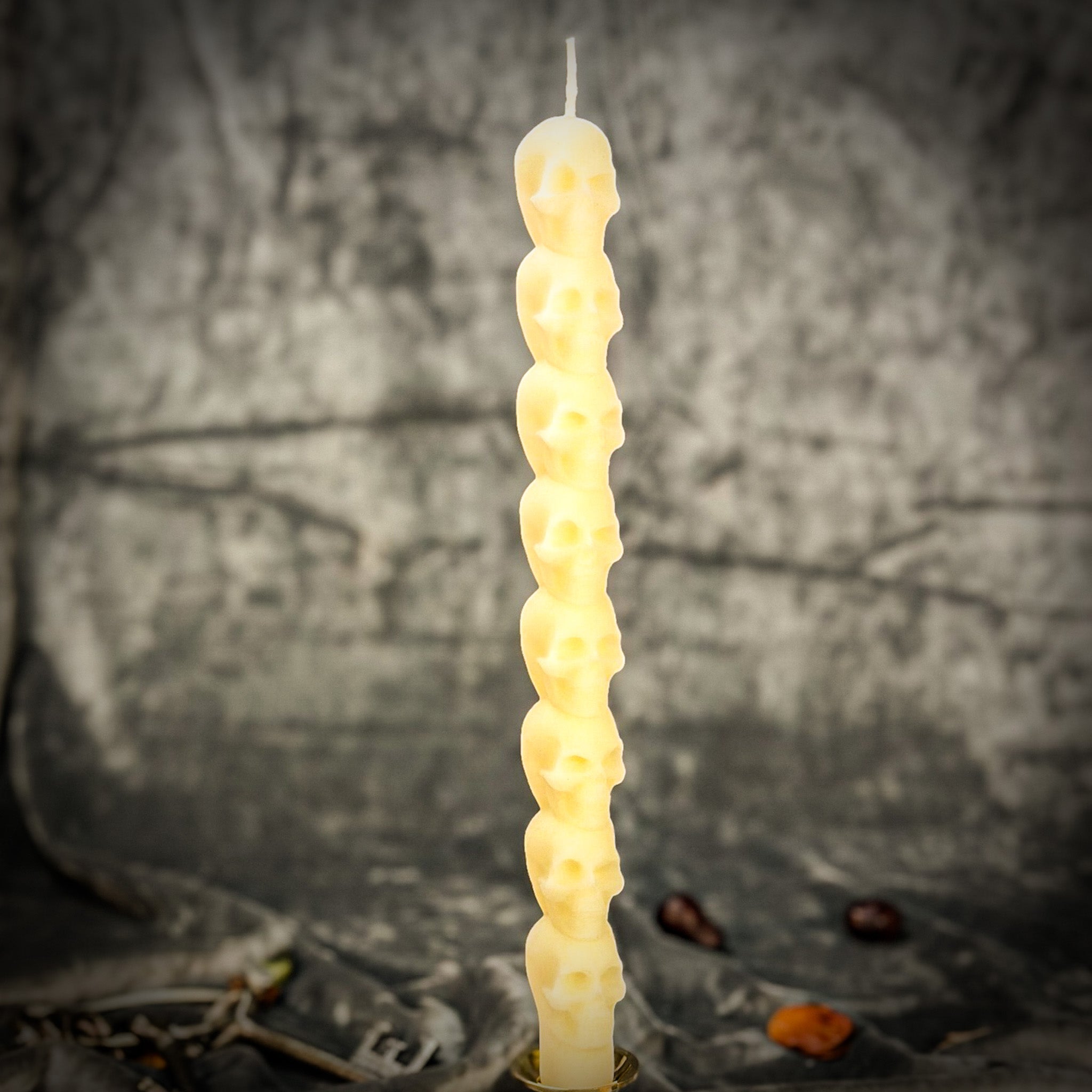 Orange Eight Day Skull Taper Candle Spell Kit by Parlour of Wonders for mind influence and ancestral wisdom rituals.