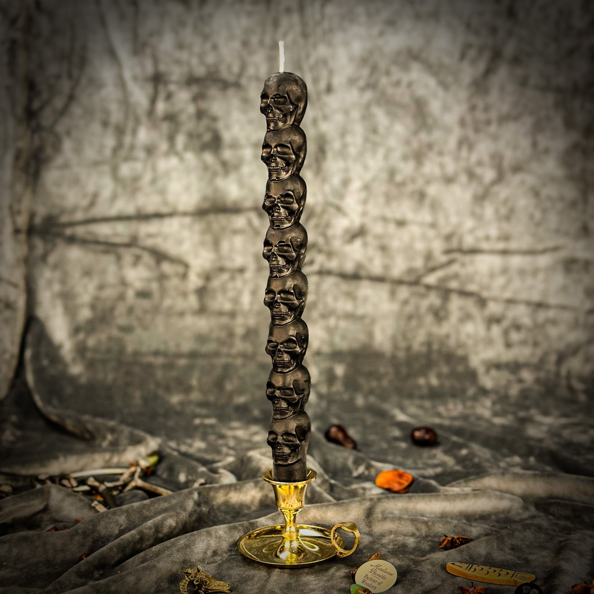 Eight Day Skull Taper Candle Spell Kit by Parlour of Wonders with orange candles for mind influence and ancestral wisdom rituals.